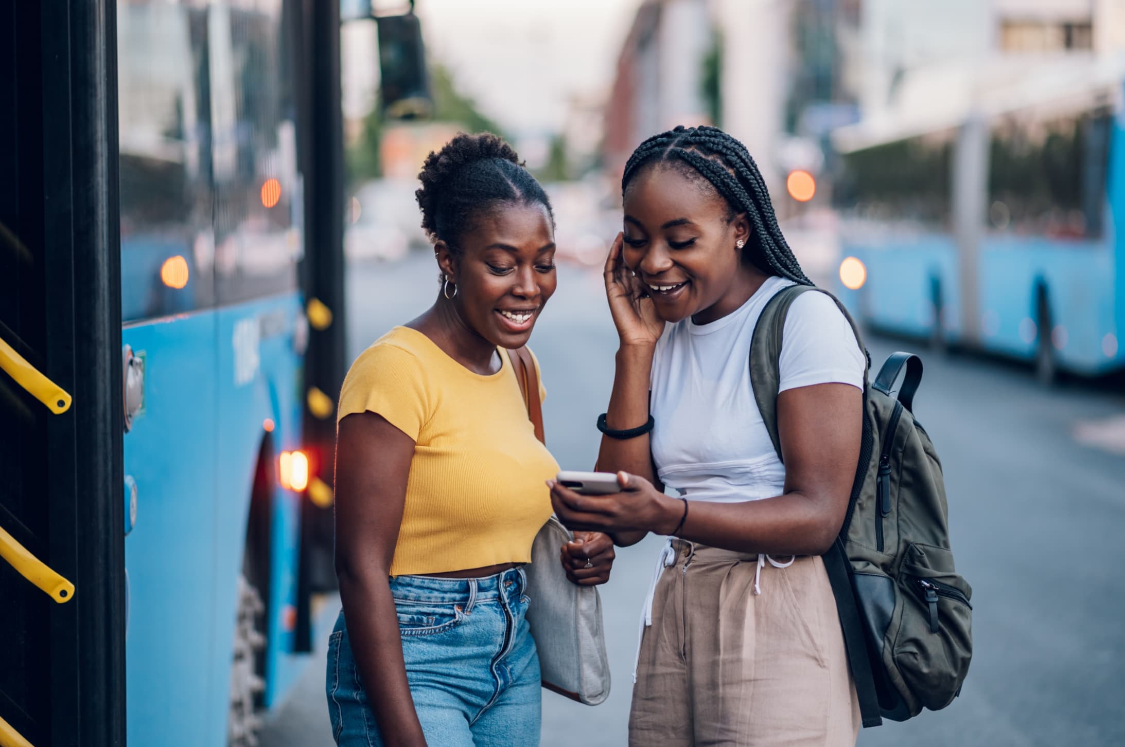 Friends waiting for bus