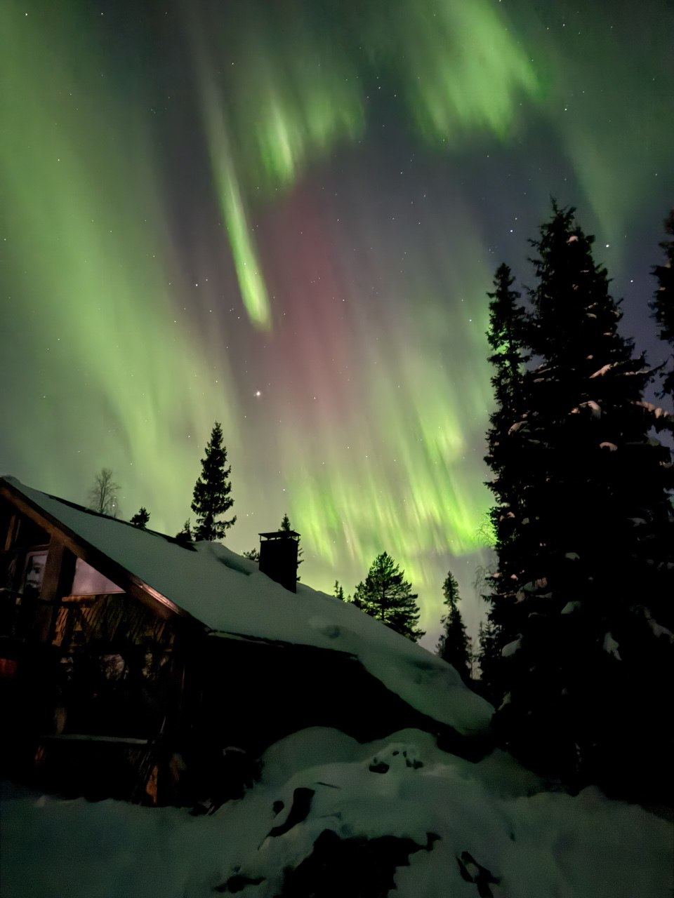 Aurora dancing over Cape Kalevala lake