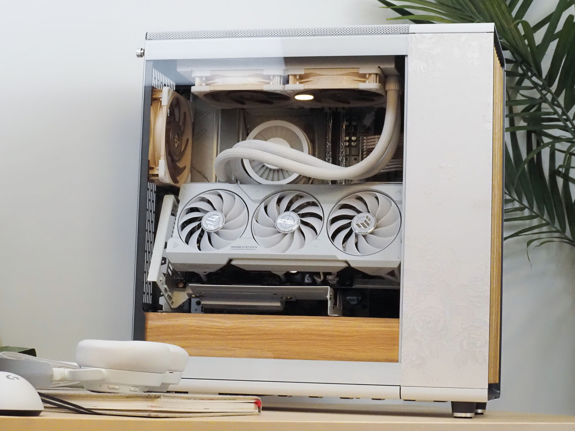 Lumiere beauty shot — a white Fractal North build with oak slats and shroud on a bright desk
