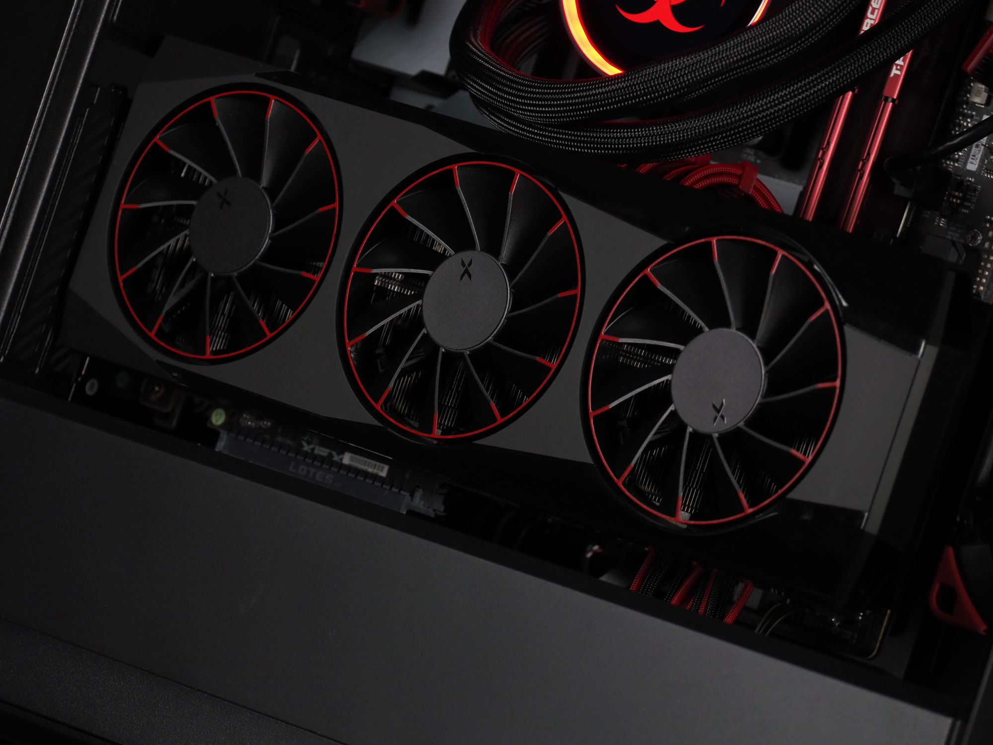 The black-and-red XFX Radeon 9070 XT, red fan rings against black blades
