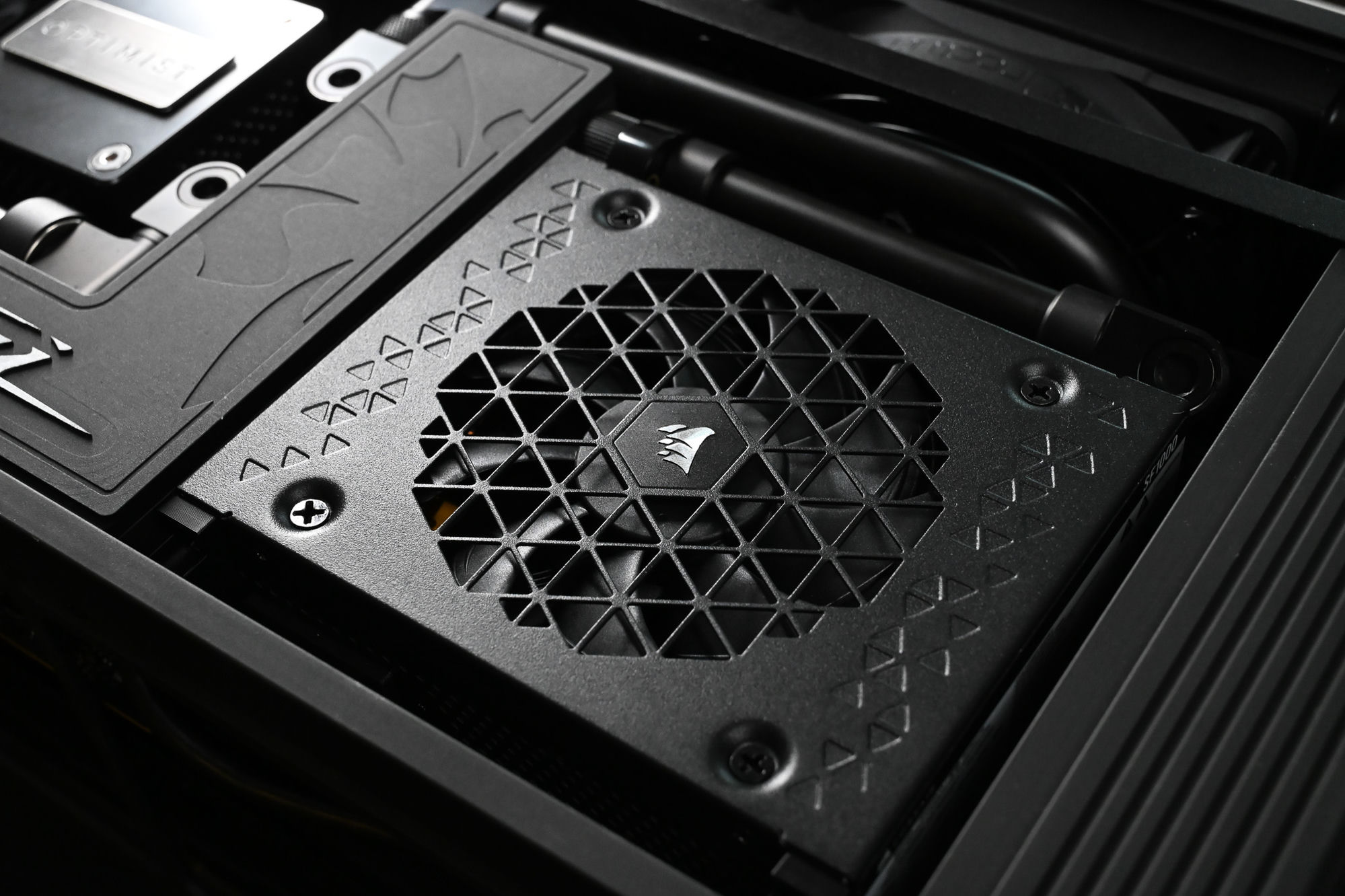 The Corsair SF1000 SFX power supply seated inside the Venturi — fully internal, no external brick