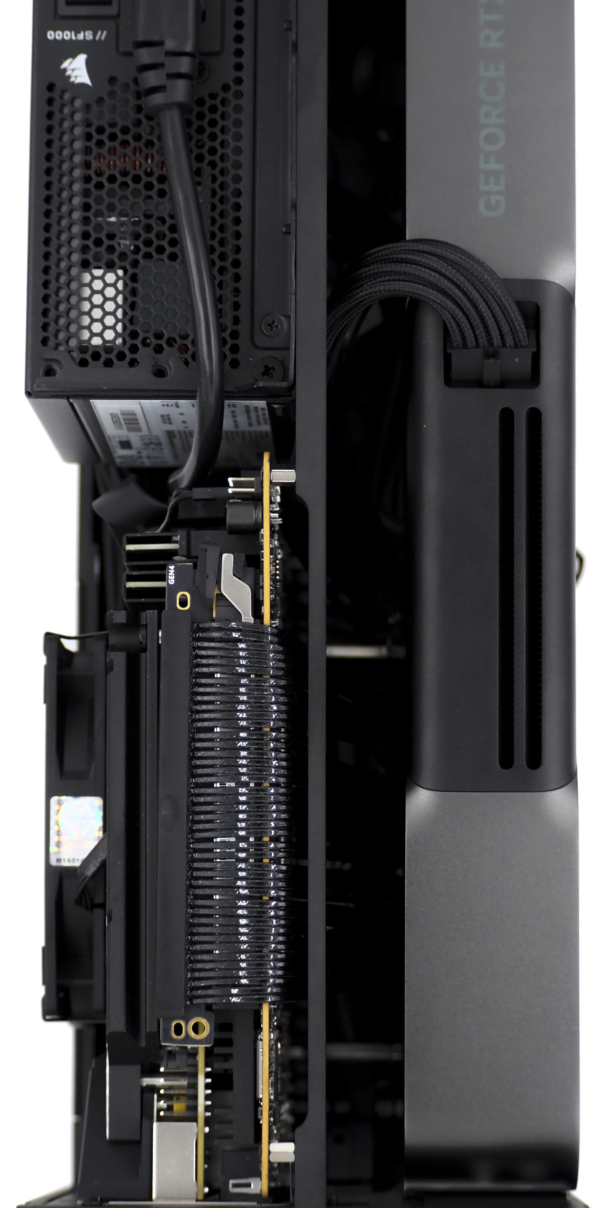The Dusk heat chamber — the graphics card extended outward, opening a channel down the spine of the FormD T1 for heat to travel