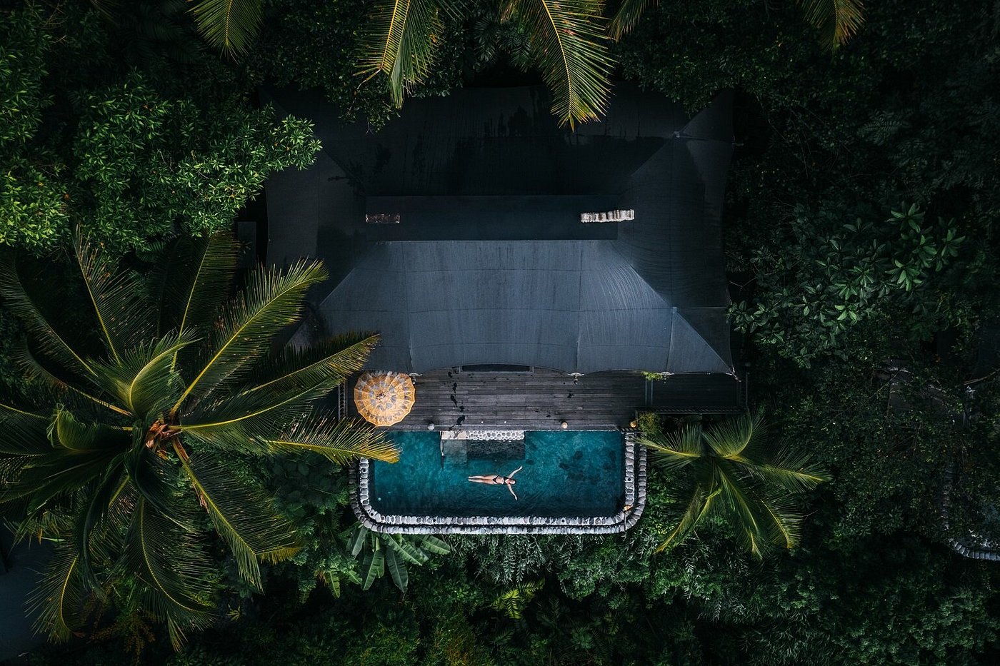 Aerial view of Capella Ubud pool and forest