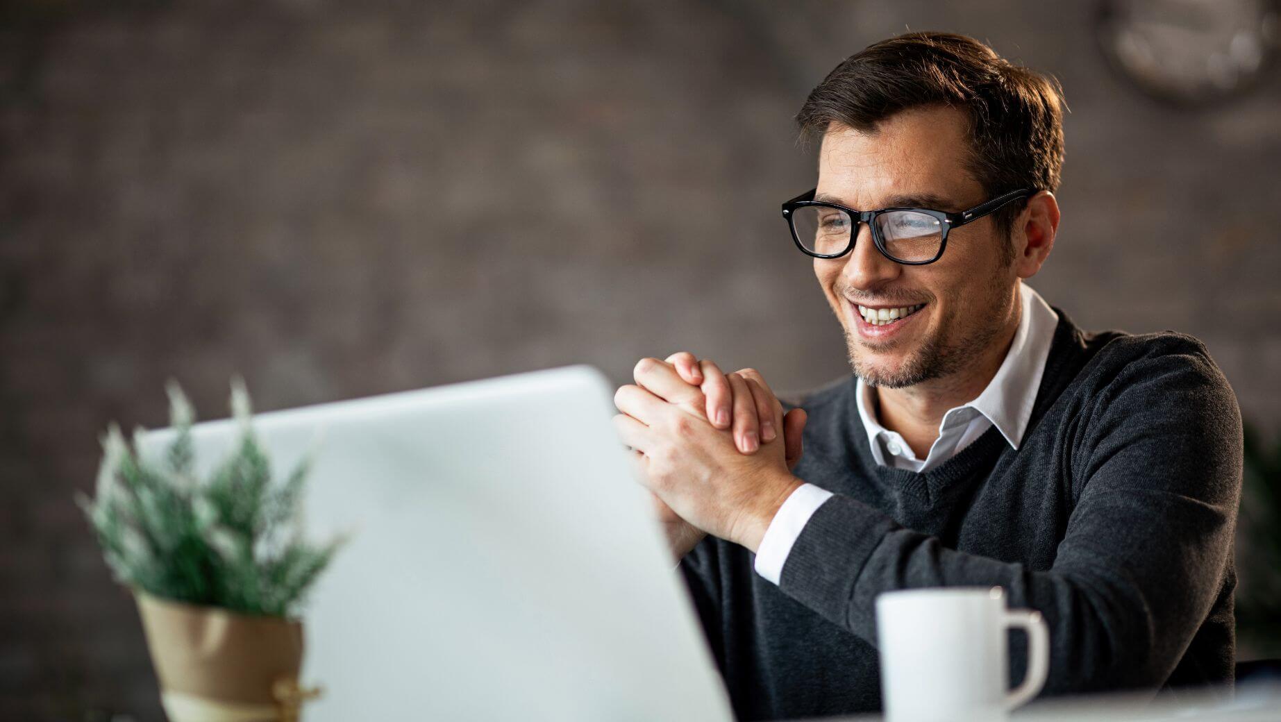 Man looking at laptop screen