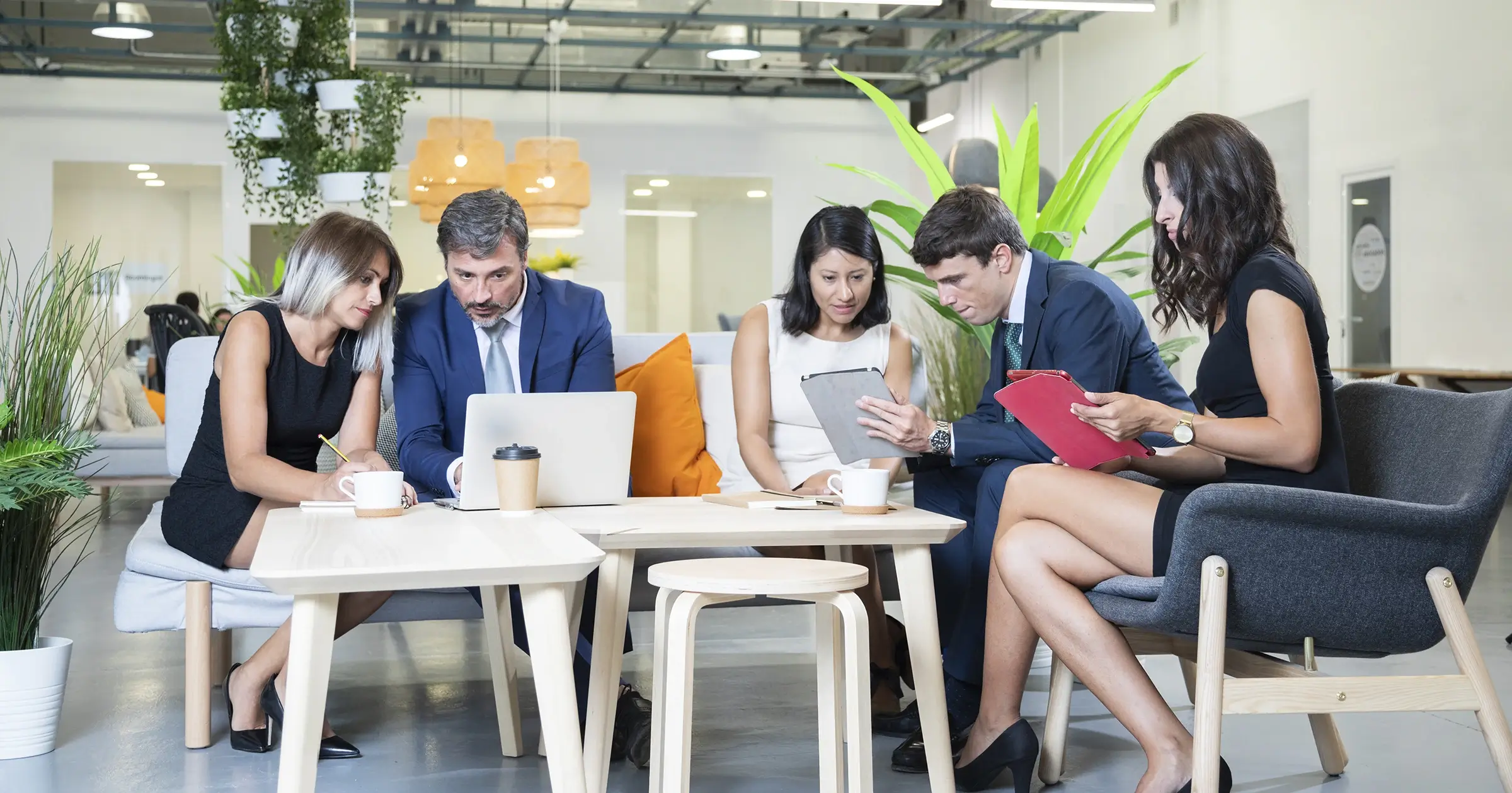 Group of people reviewing projects in the office