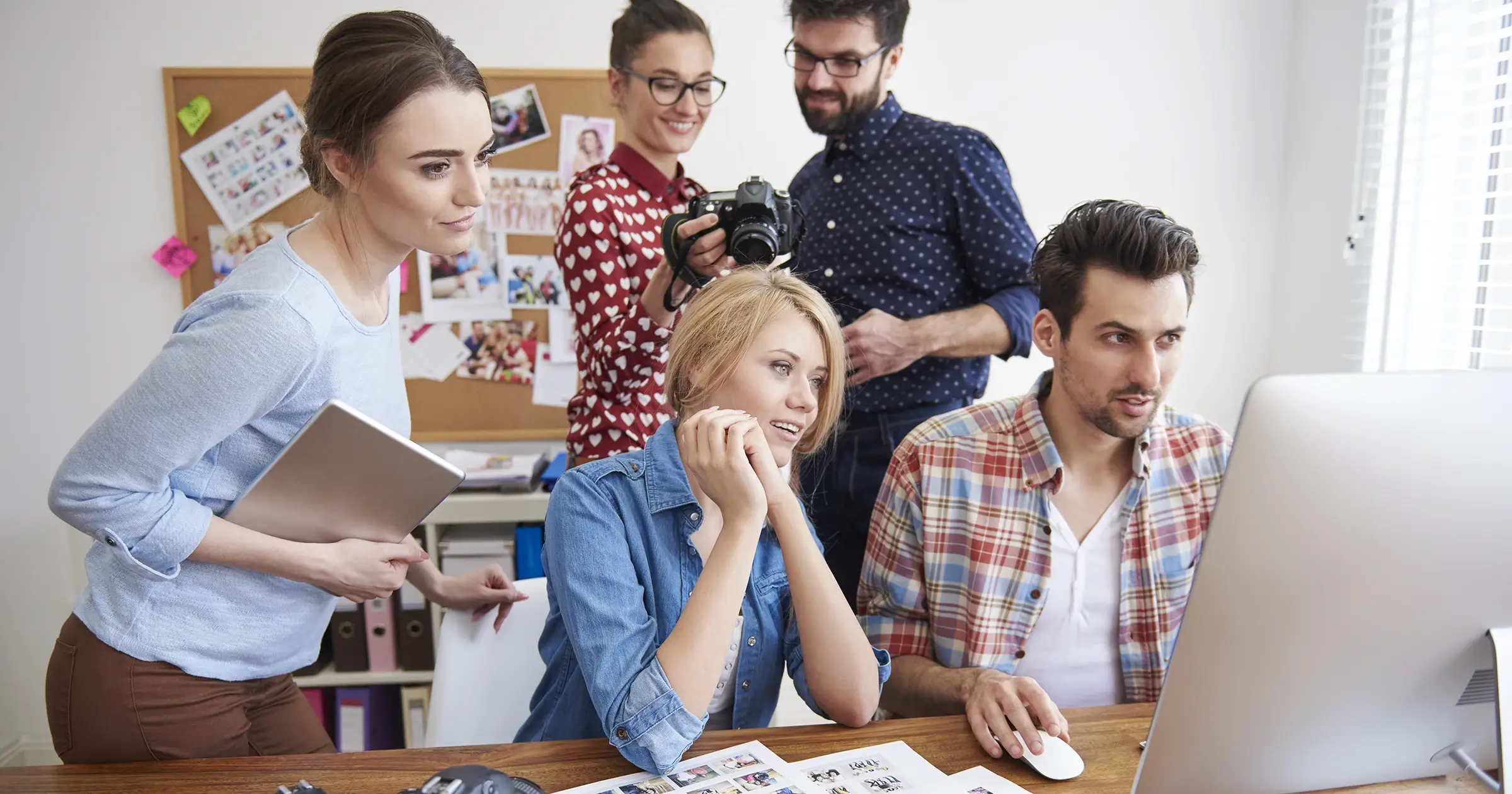 Agency team members reviewing photography