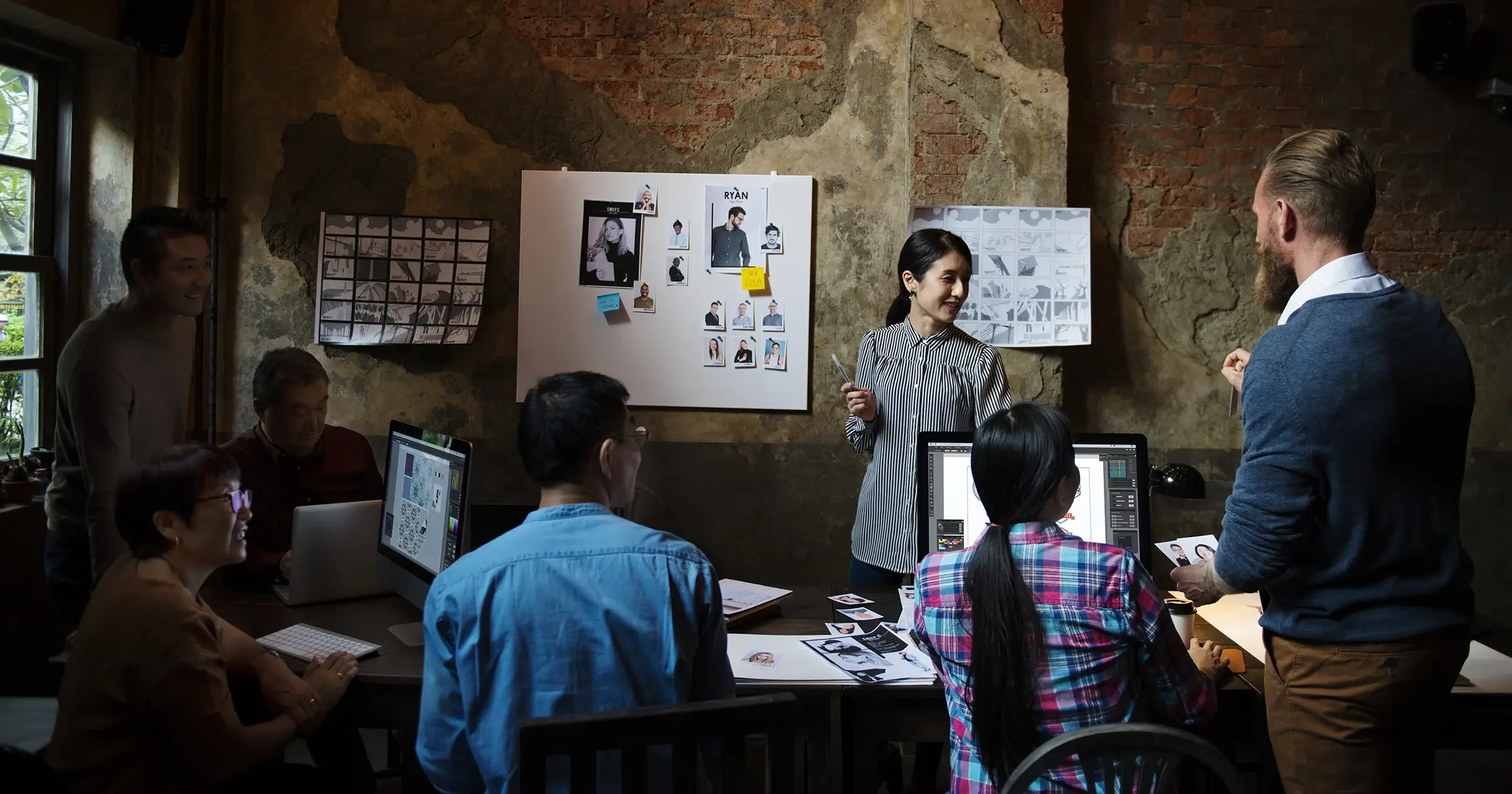 Woman making a presentation in front of a team