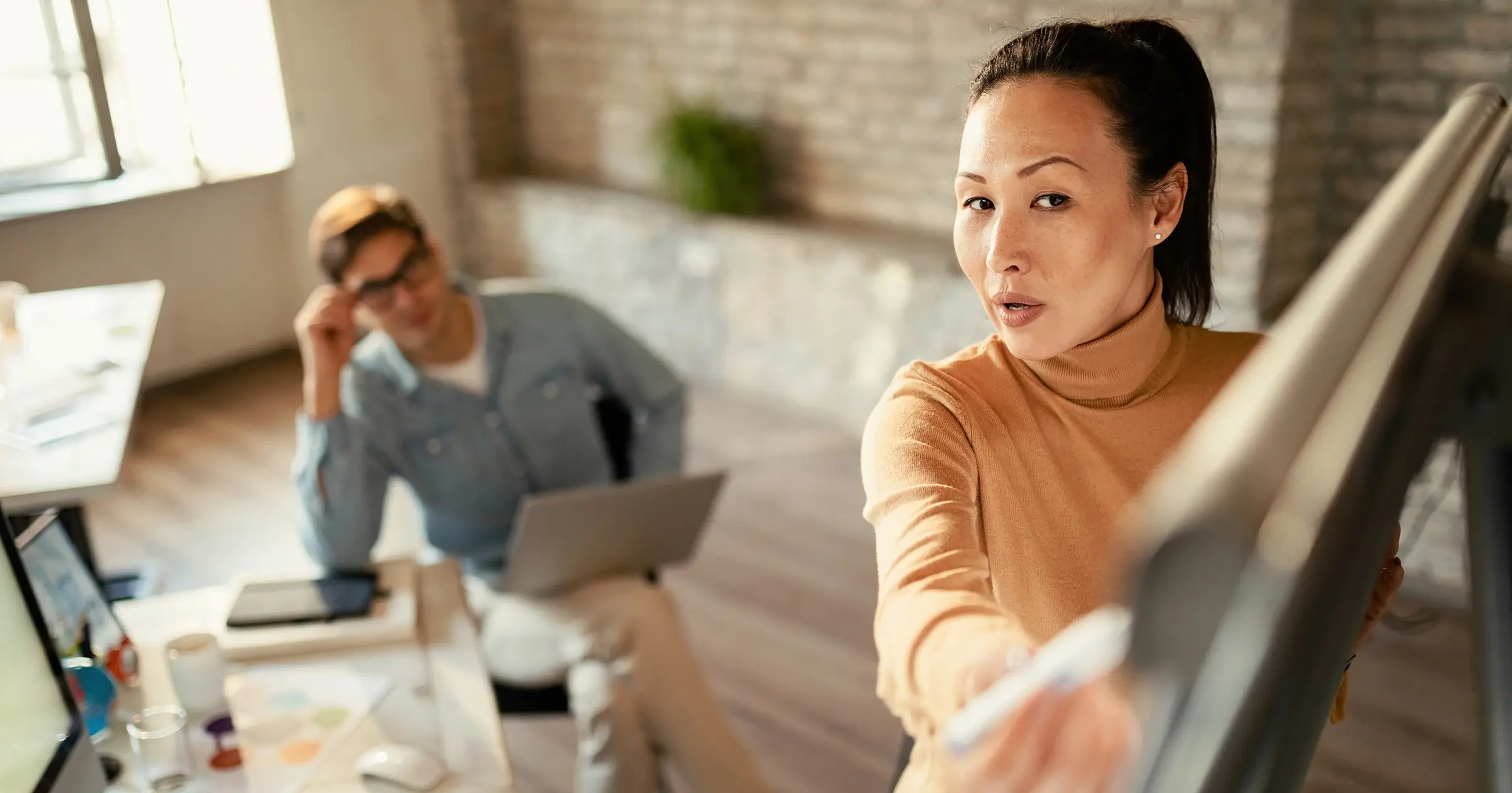 Female boss explaining a project