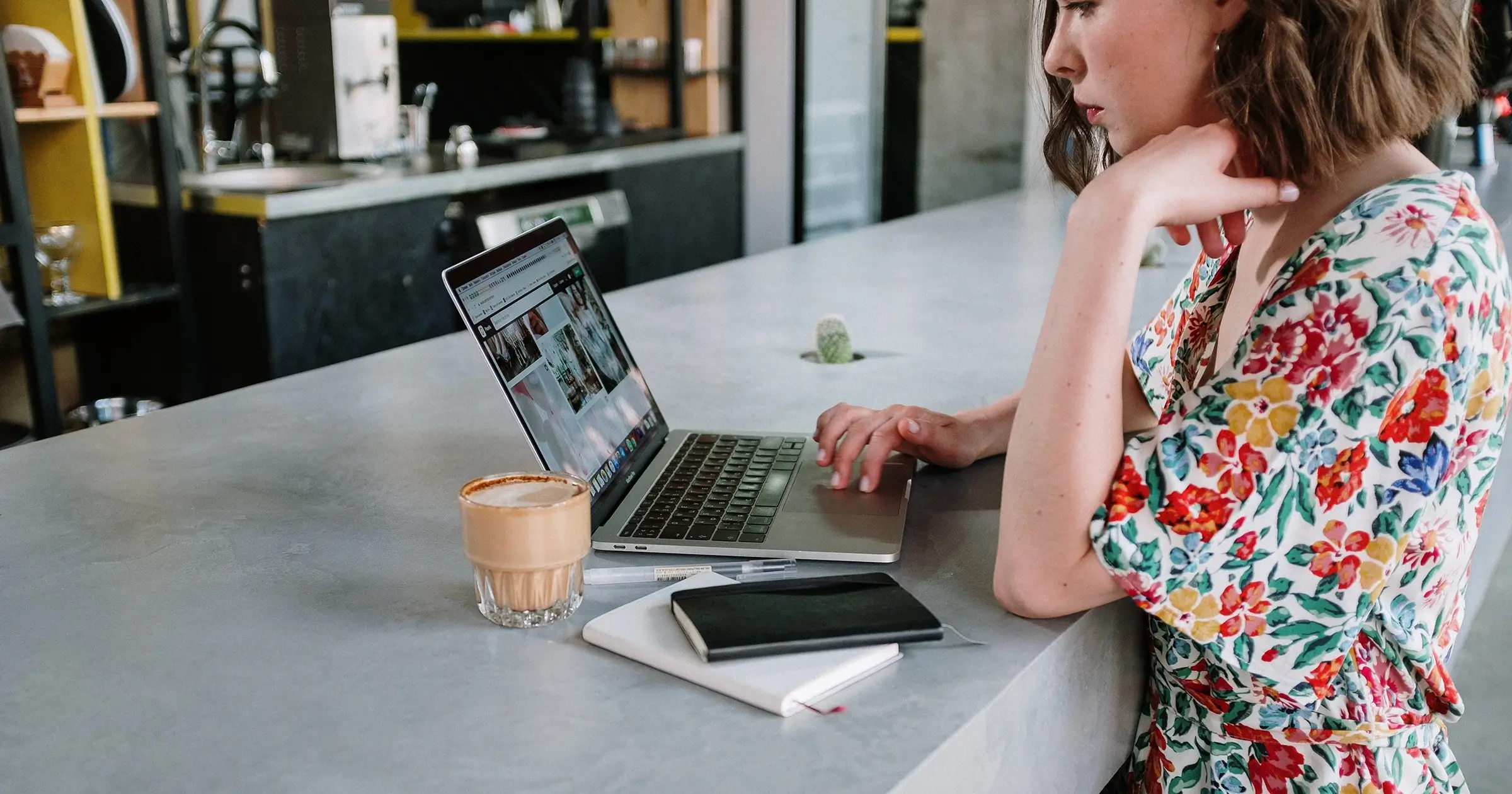 Woman working from a cafe