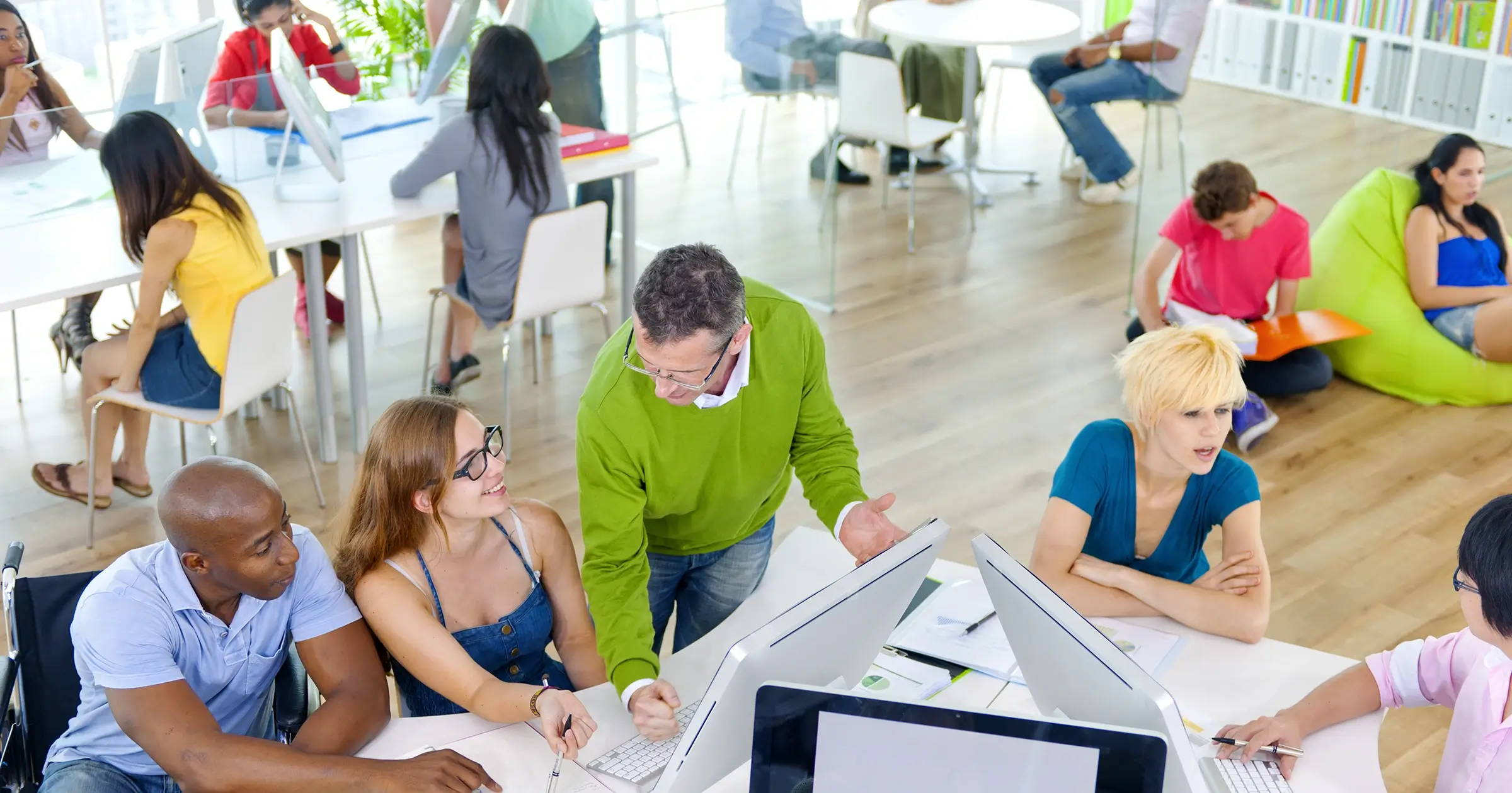 A group of people in a bright and colorful office