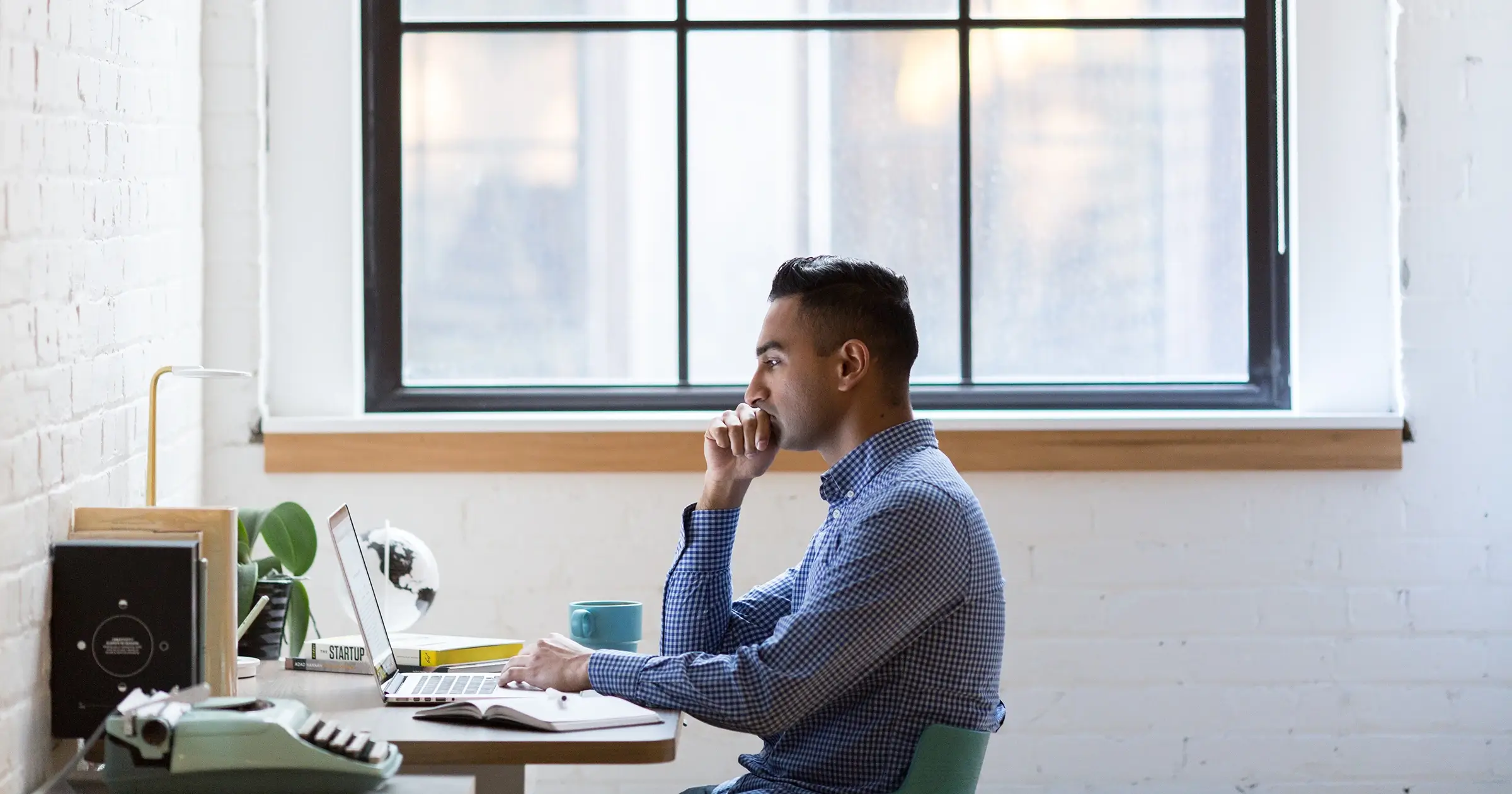 Man on his phone in the office