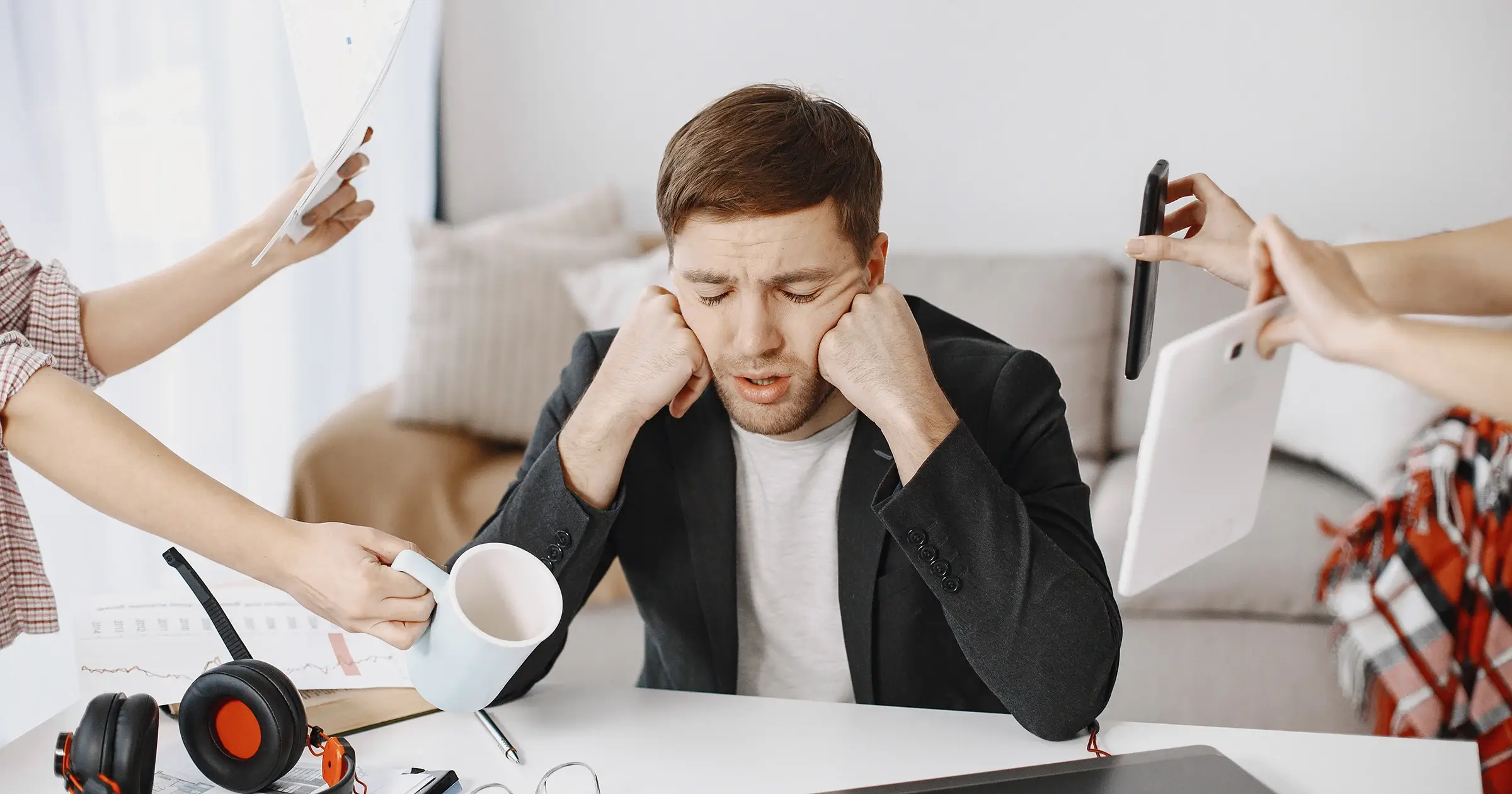 Man stressed by so many work tasks