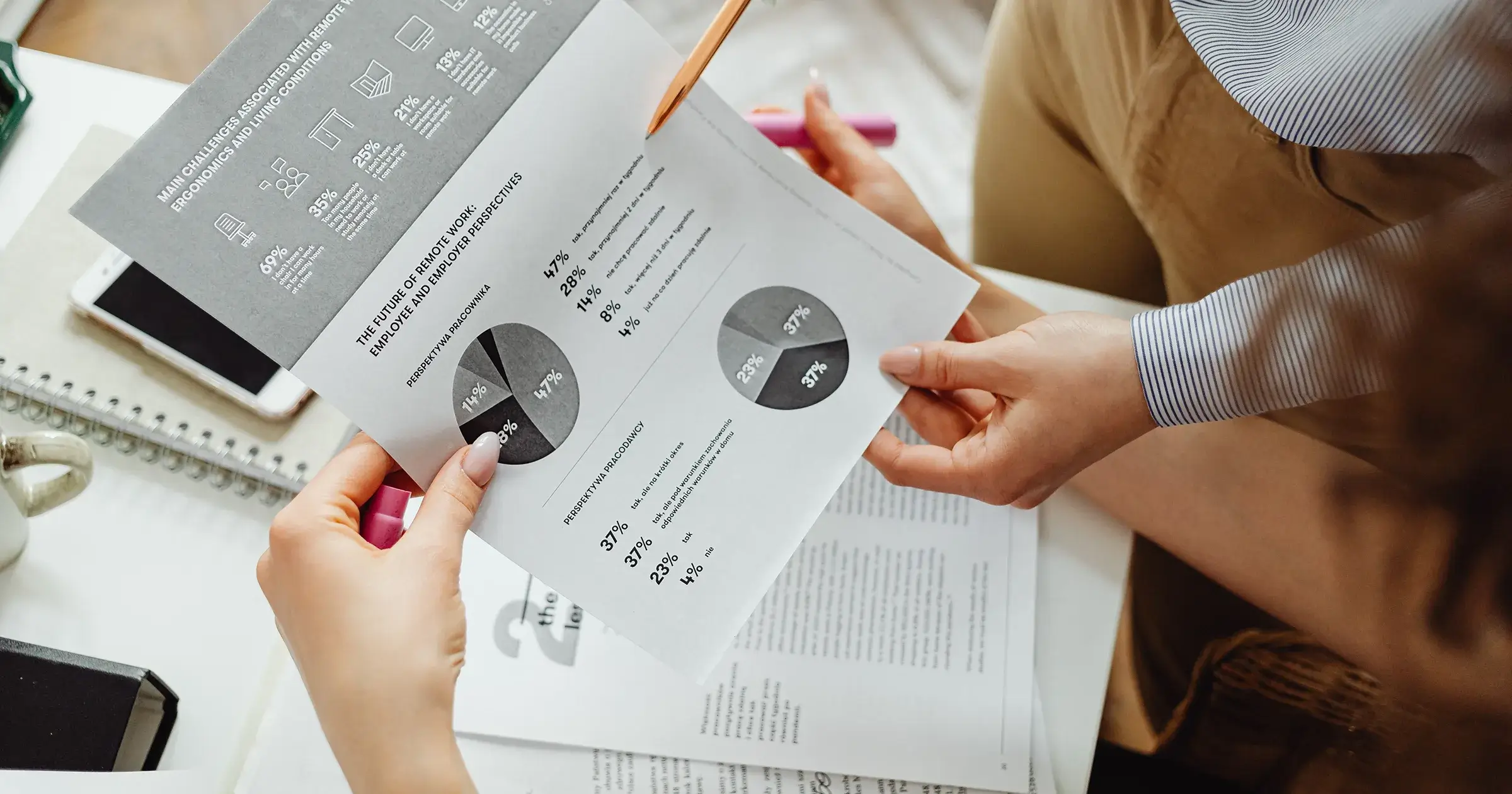 Two people looking at a chart