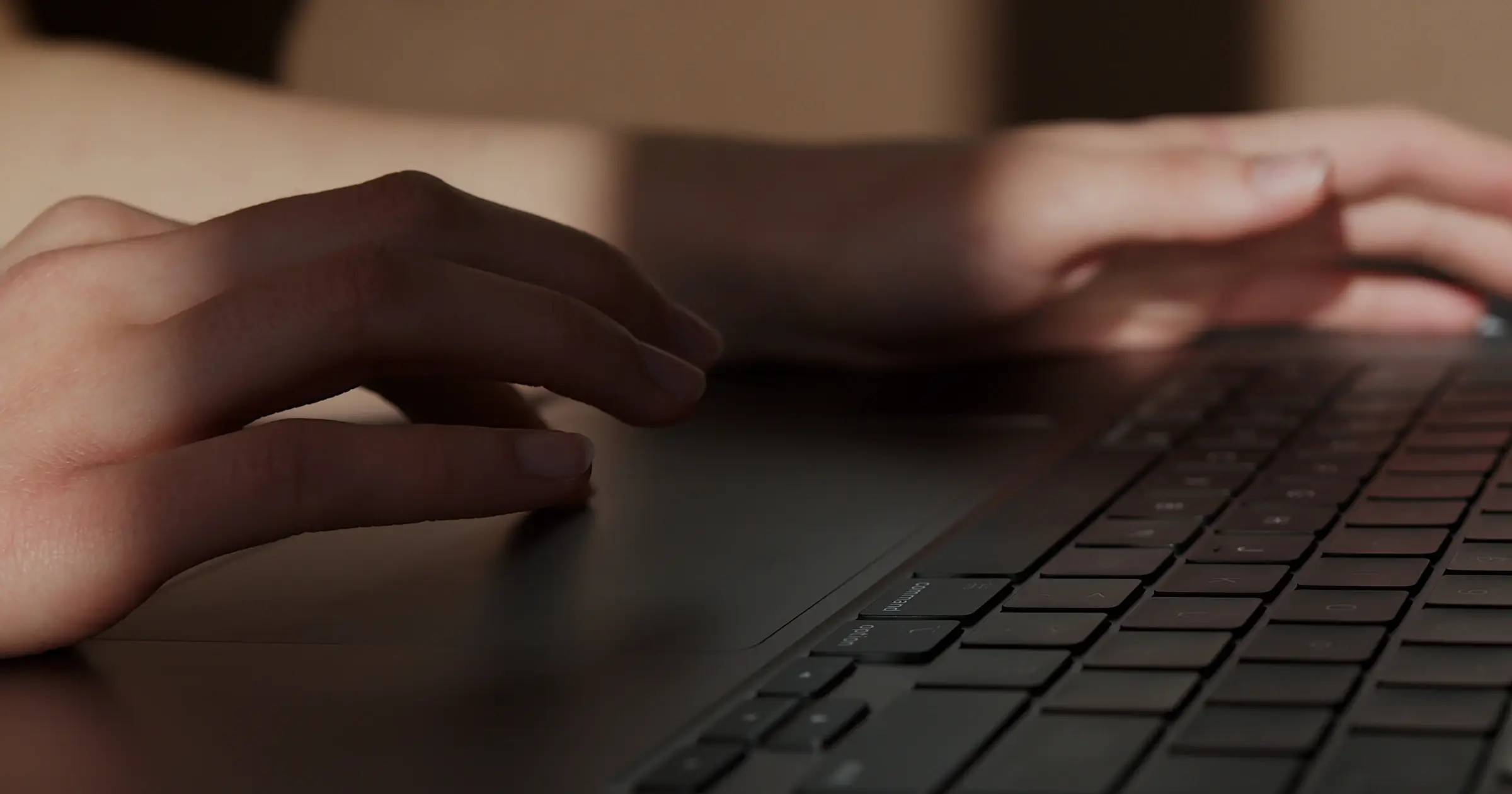 Closeup of hands typing at the keyboard