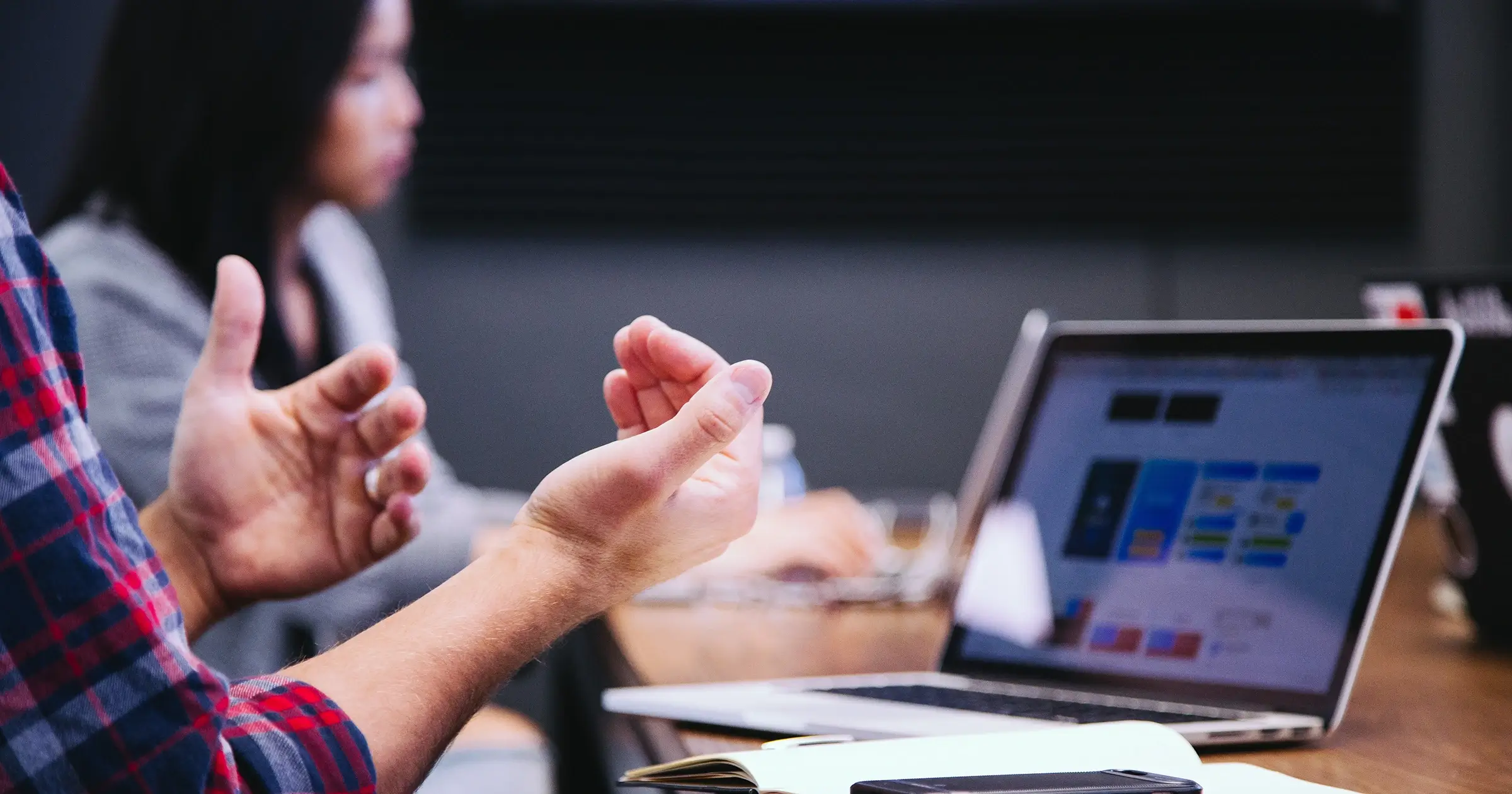 Person explaining an idea in a meeting