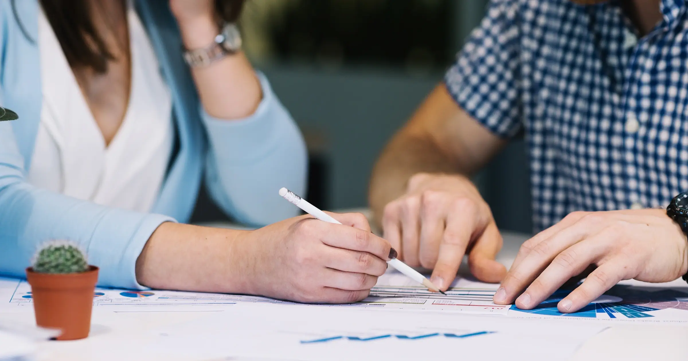 Two people looking at a diagram