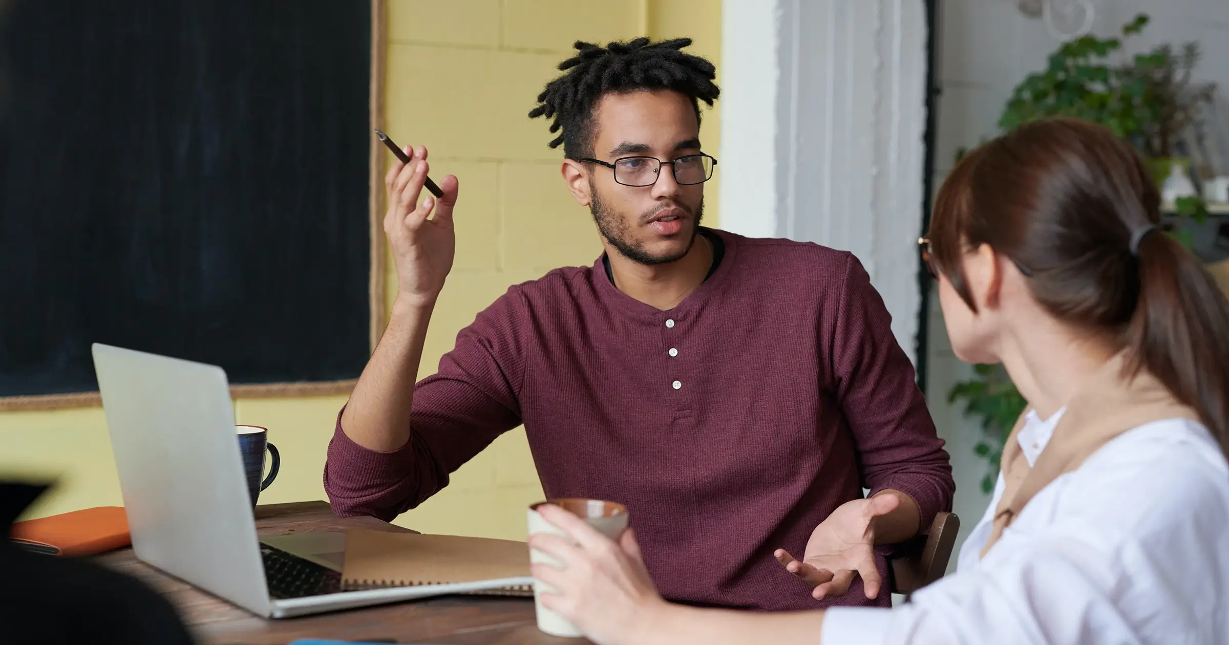 Two team members in discussion