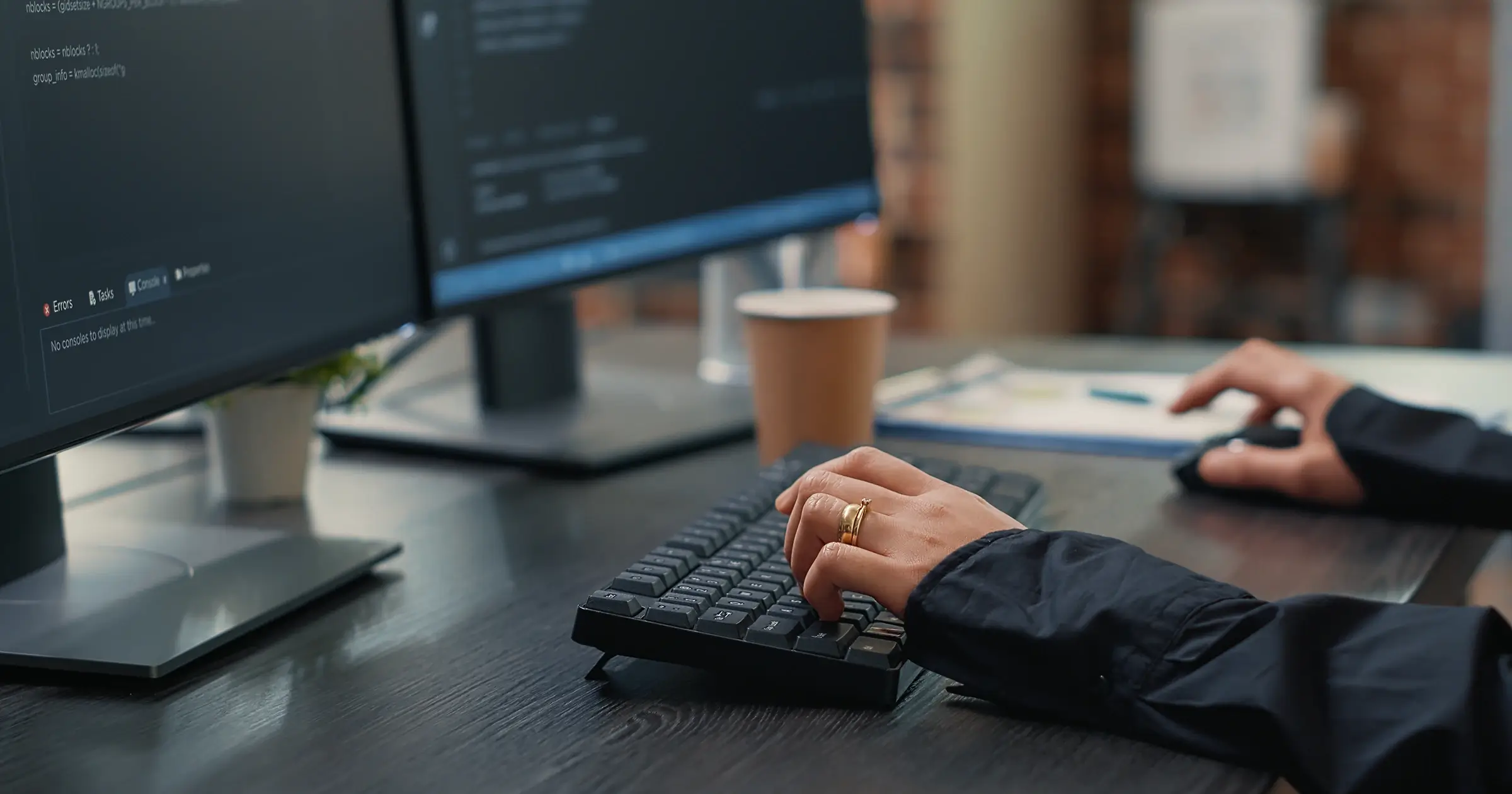 Developer using 2 screens