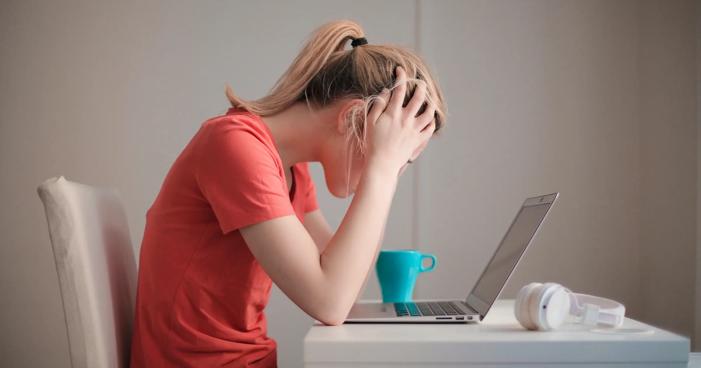 Woman receiving negative feedback at work