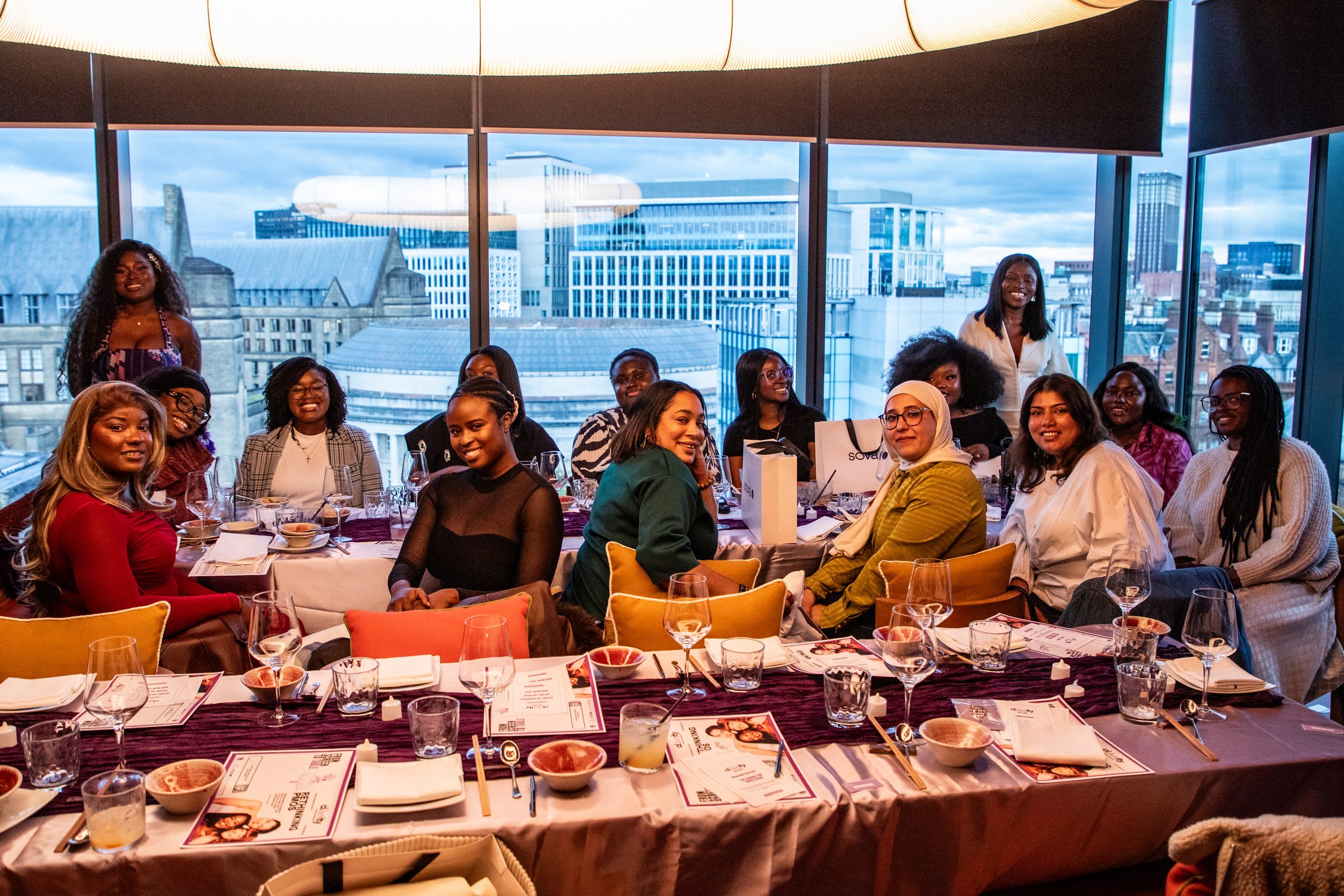 Guests gathered around the table at The Table by Clherity in Manchester