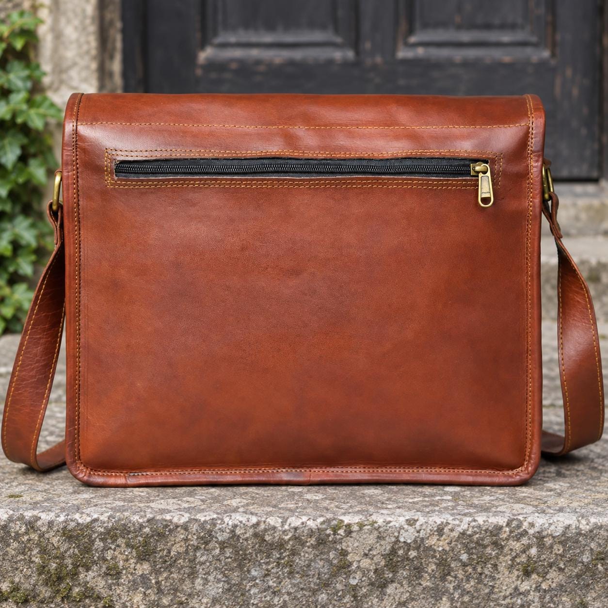 Handcrafted brown leather messenger bag interior