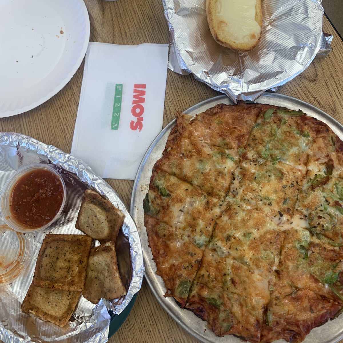 Imo's Pizza - thin crust pizza, toasted ravioli, garlic cheese bread