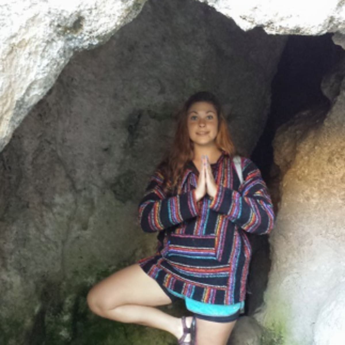 Yogi-ing in a cave near the falls!