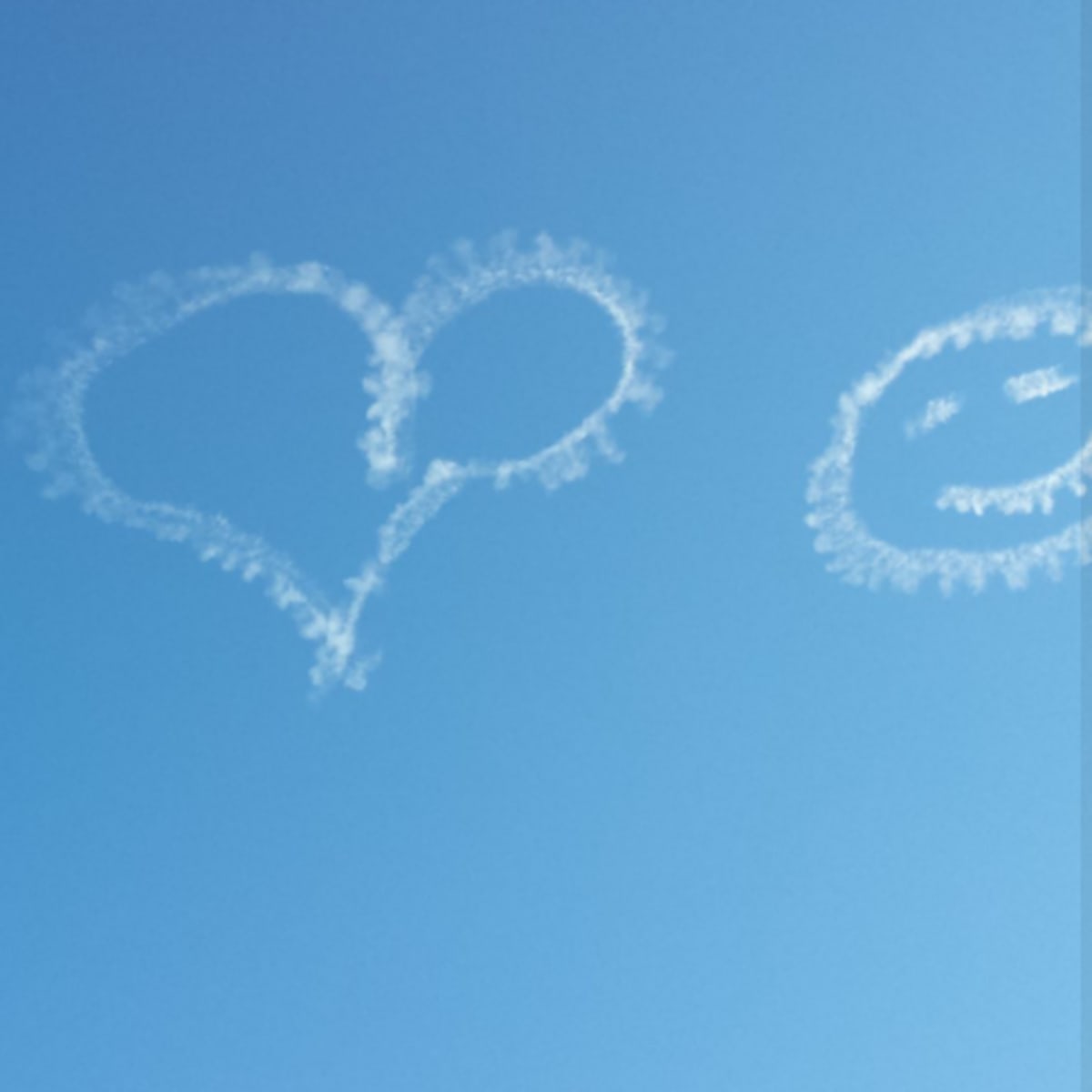 Airplanes writing in the sky at Jazz Fest