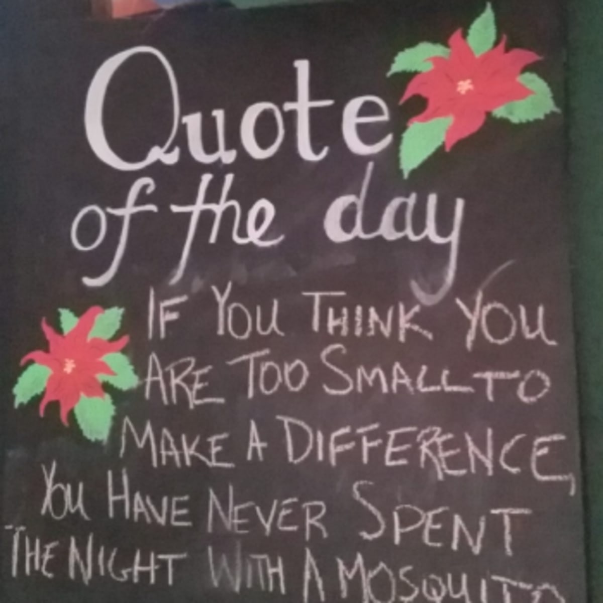 A chalkboard outside on of the shops at Pike's Place Market