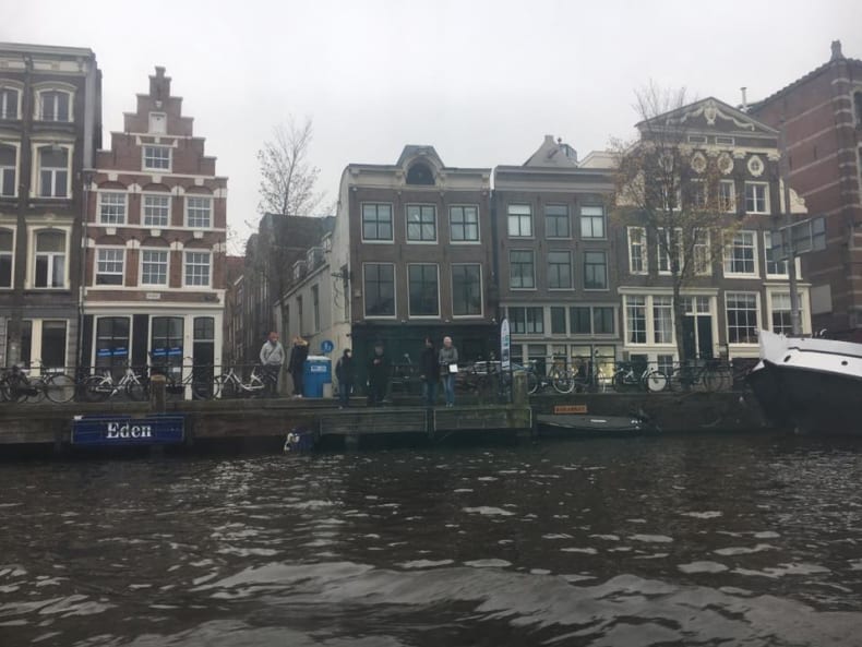 Amsterdam getaway: charming canals and vibrant urban culture.