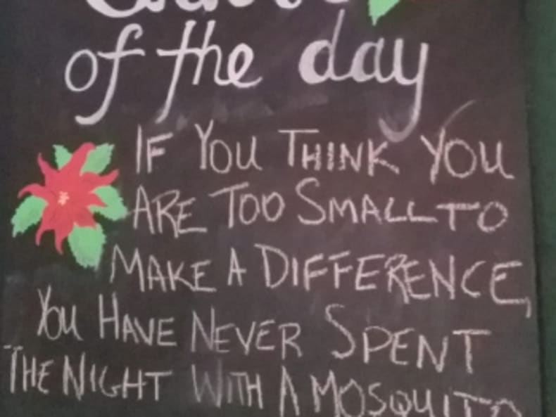 A chalkboard outside on of the shops at Pike's Place Market