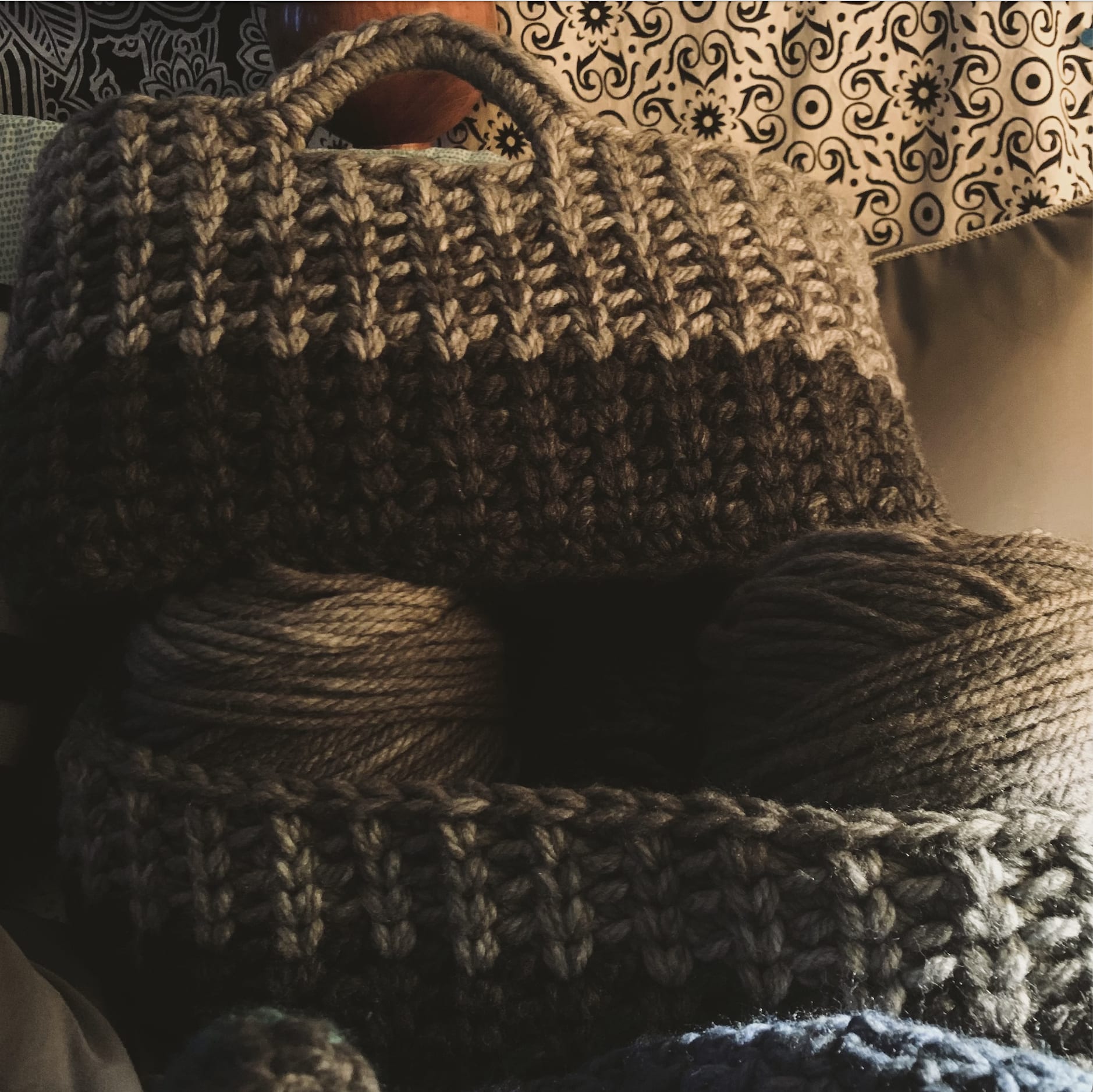 Chunky crochet storage basket in earth tones