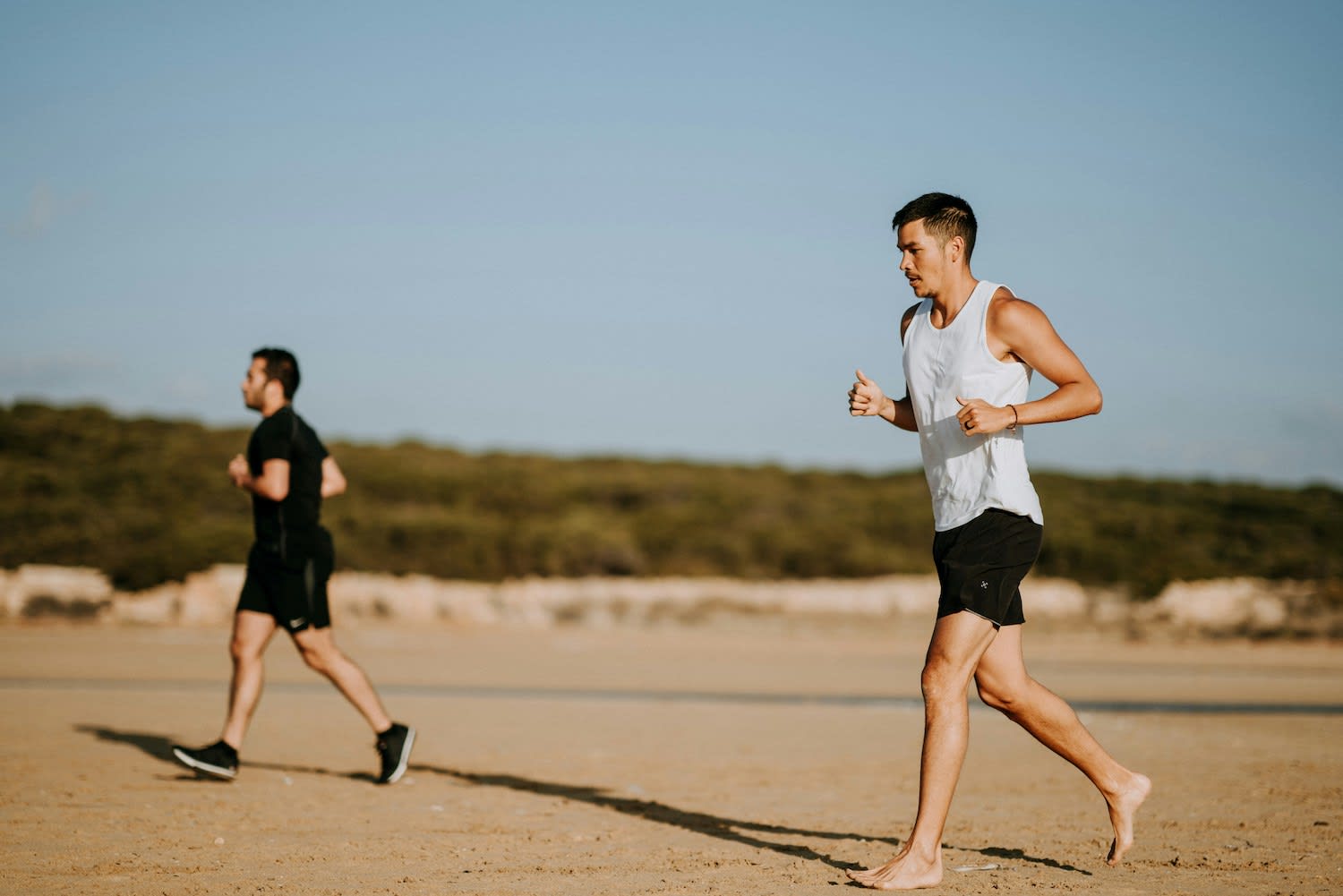 Men Running in the Sun