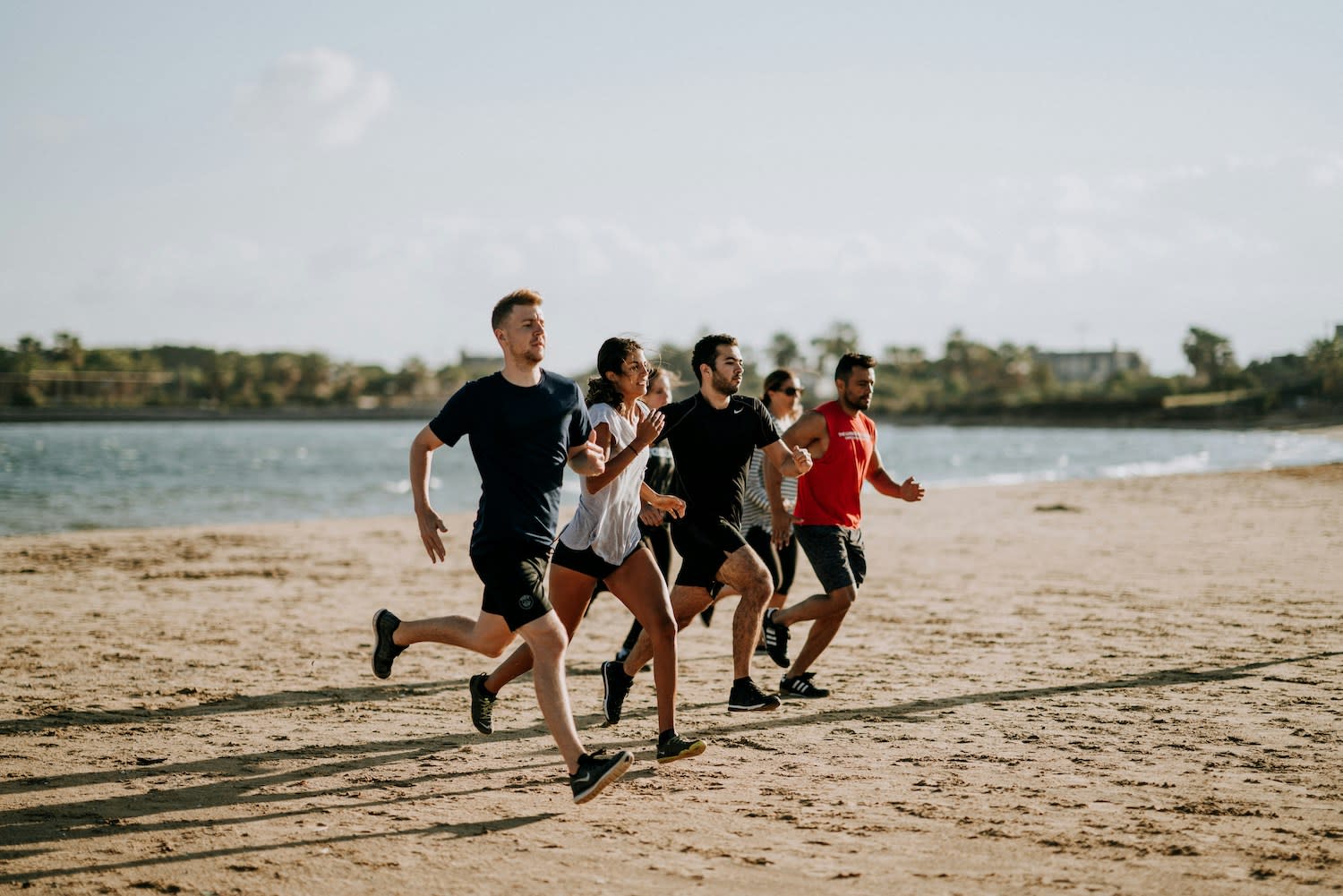Running with a Group on the Beach