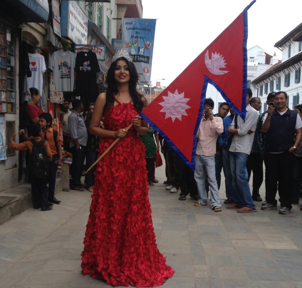 Malina Joshi holding National Flag for Miss Asia Pacific Introduction