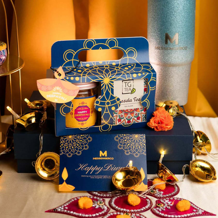 Deepavali corporate gift set with custom blue gift box, muruku, masala tea, diya and personalised gift card tag by MessengerCo