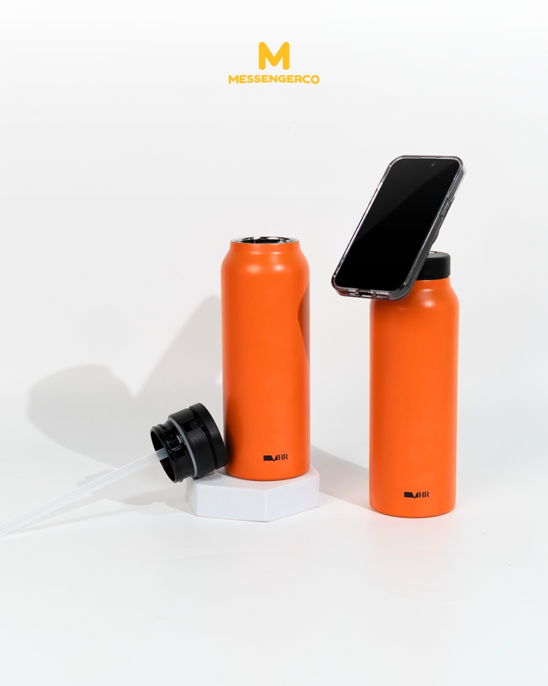 A shiny orange thermos flask featuring a professional logo print, ideal for corporate gifts or branded promotions.