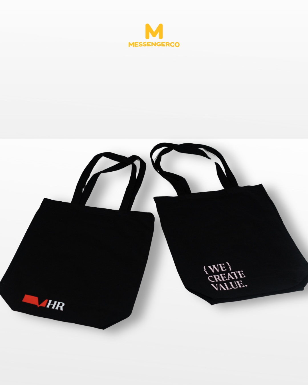 A black tote bag with a custom logo, ideal for promotional use, shown on a plain background, from past project showcases.