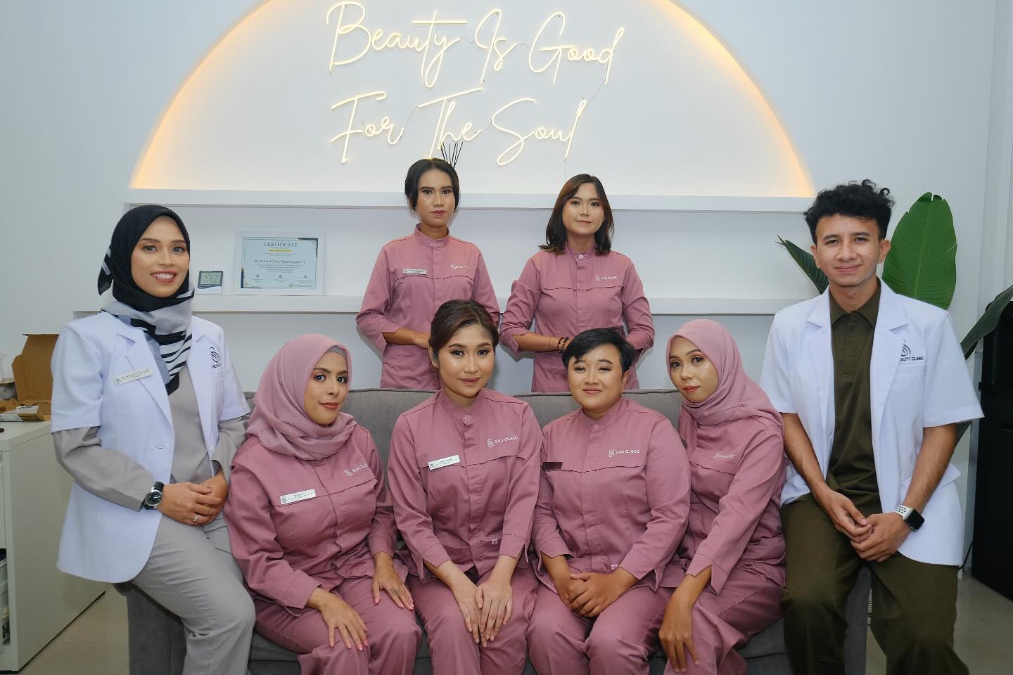SAS Clinic Team in White & Pink Outfits