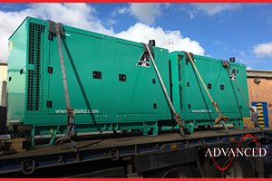 Two Cummins diesel generators leaving the yard to provide power for a website hosting company