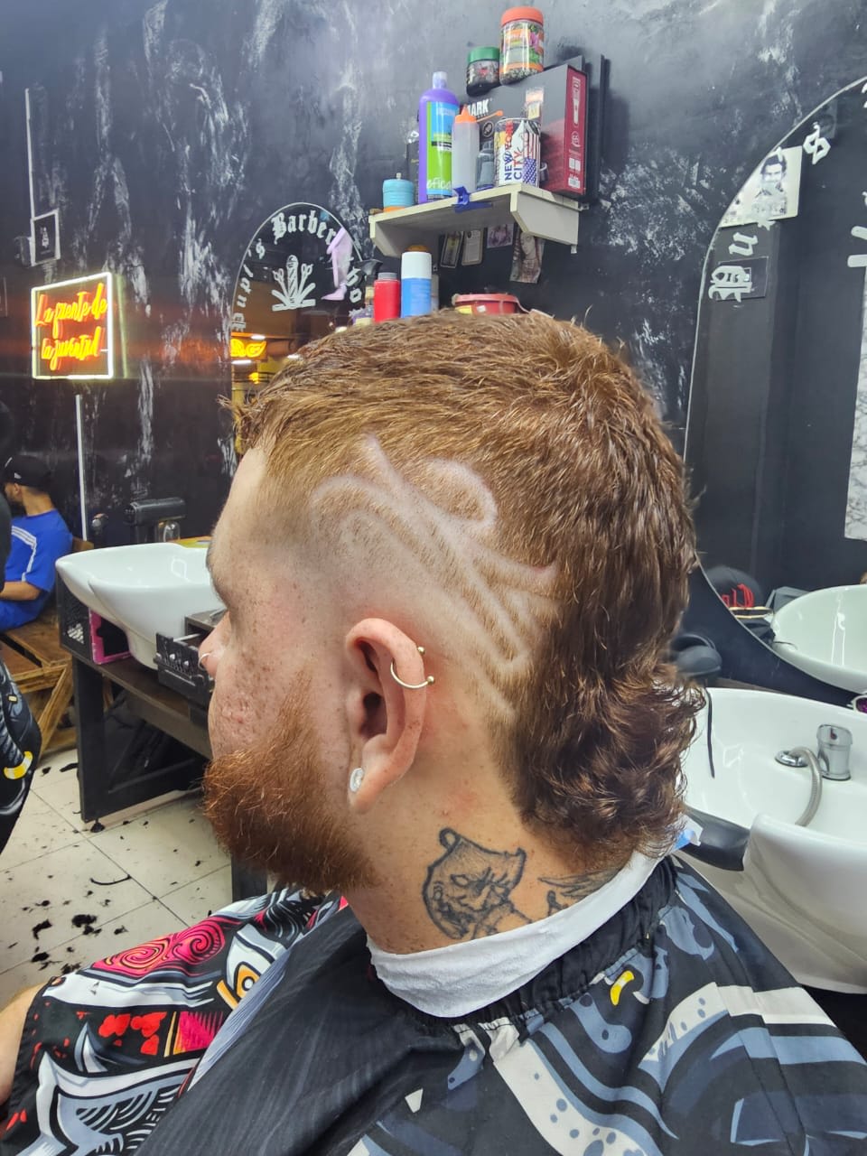 Corte de cabello degradado en Pupi's Barbershop