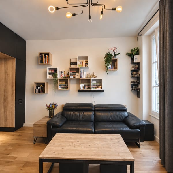Salon souplex Place de Clichy après rénovation complète – aménagement sur mesure et optimisation de l’espace – ICOSA CONCEPTION
