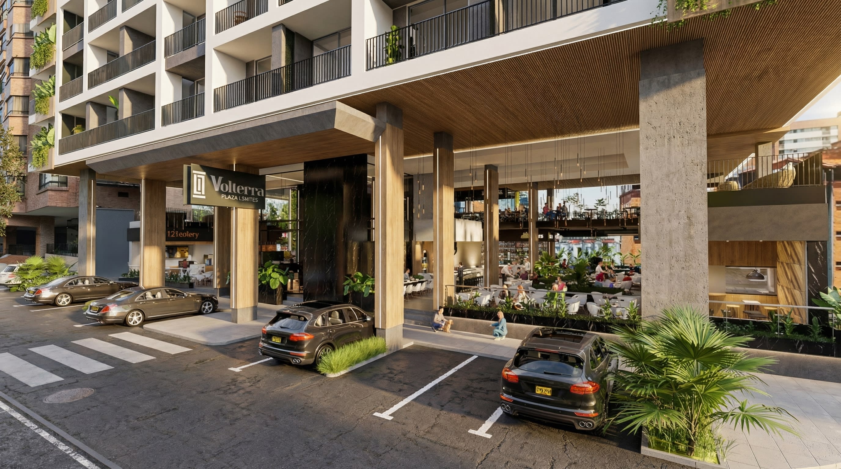 Acceso vehicular y locales gastronómicos del primer nivel de Volterra Plaza Suites.