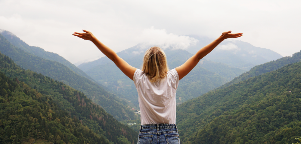 Woman looking at the scenic mountain view