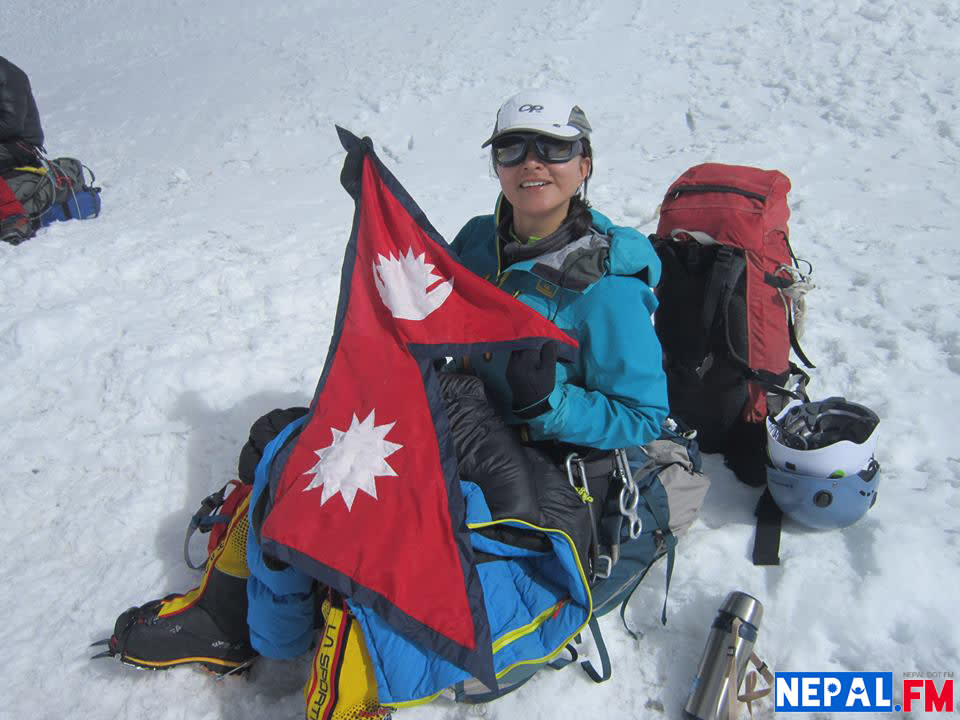 Nisha Adhikari on top of MT Everest Nepal