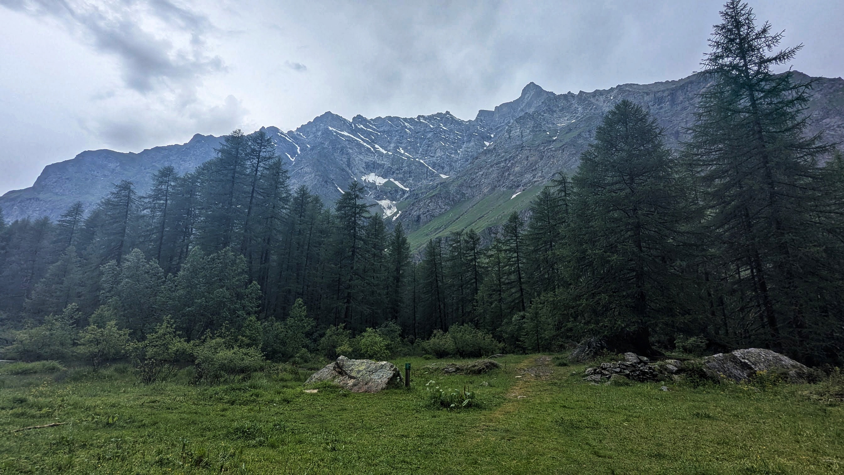 The mountains surrounding the waterfall