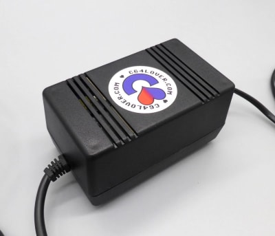 Alimentation pour Commodore 64 noir.NEUF. Alimentation pour Commodore 64 noir.