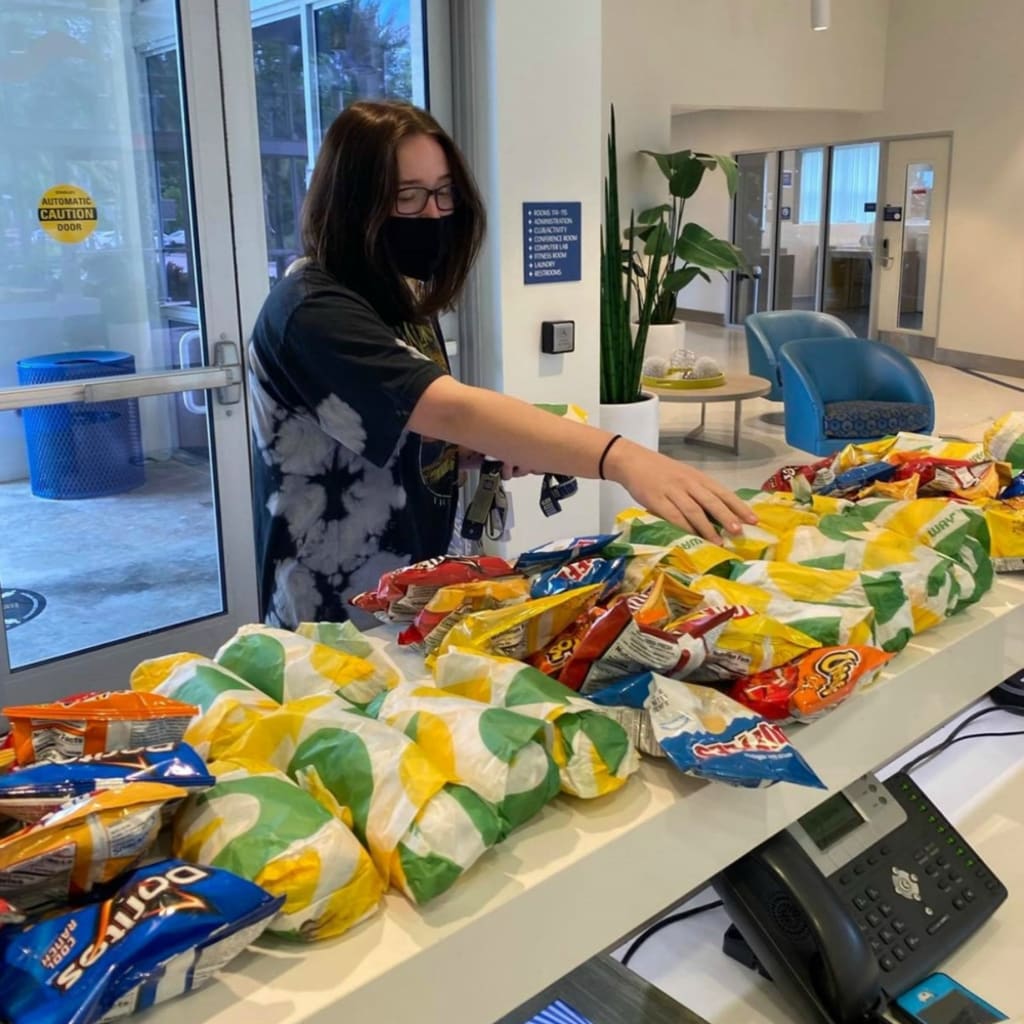 Vice Provost's Council committee members feed students in Bayview