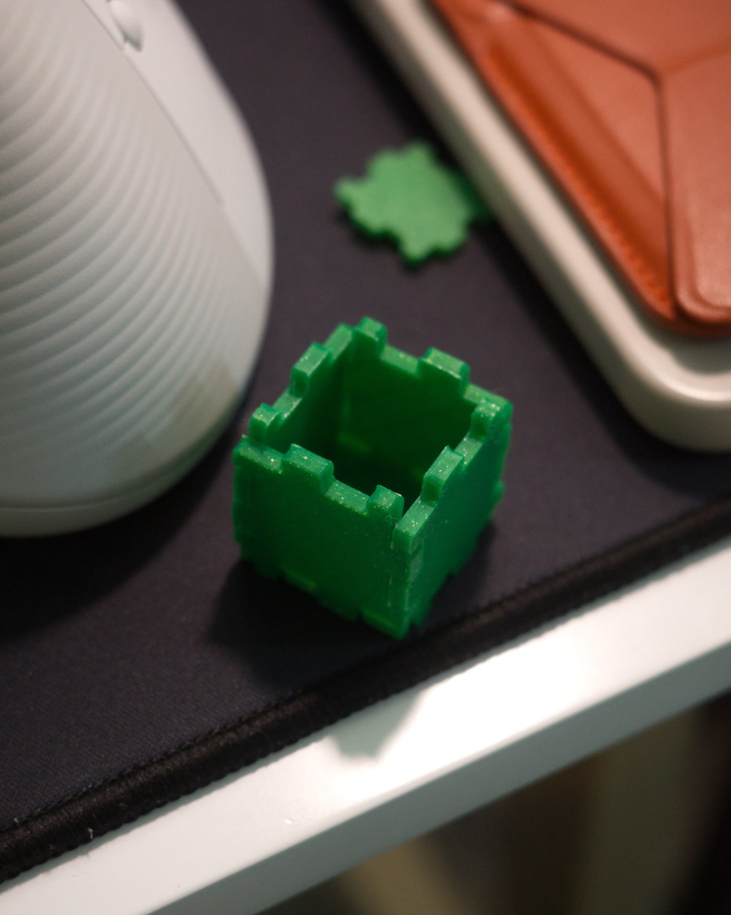 a photo of a 3d printed box testing interference fit 