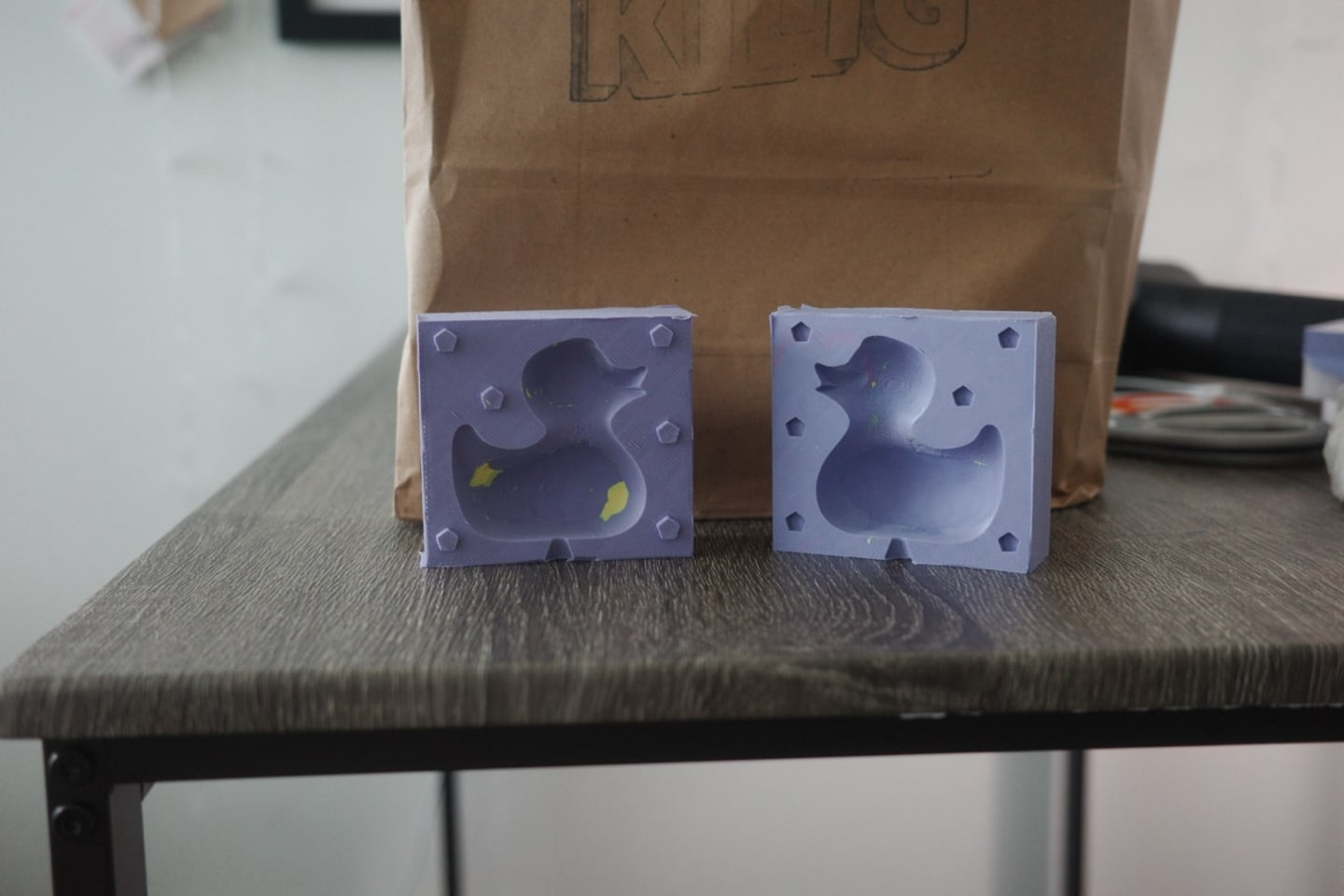 Photo of two purple moldes side by side on a table. This was the correct mold of molds design. 